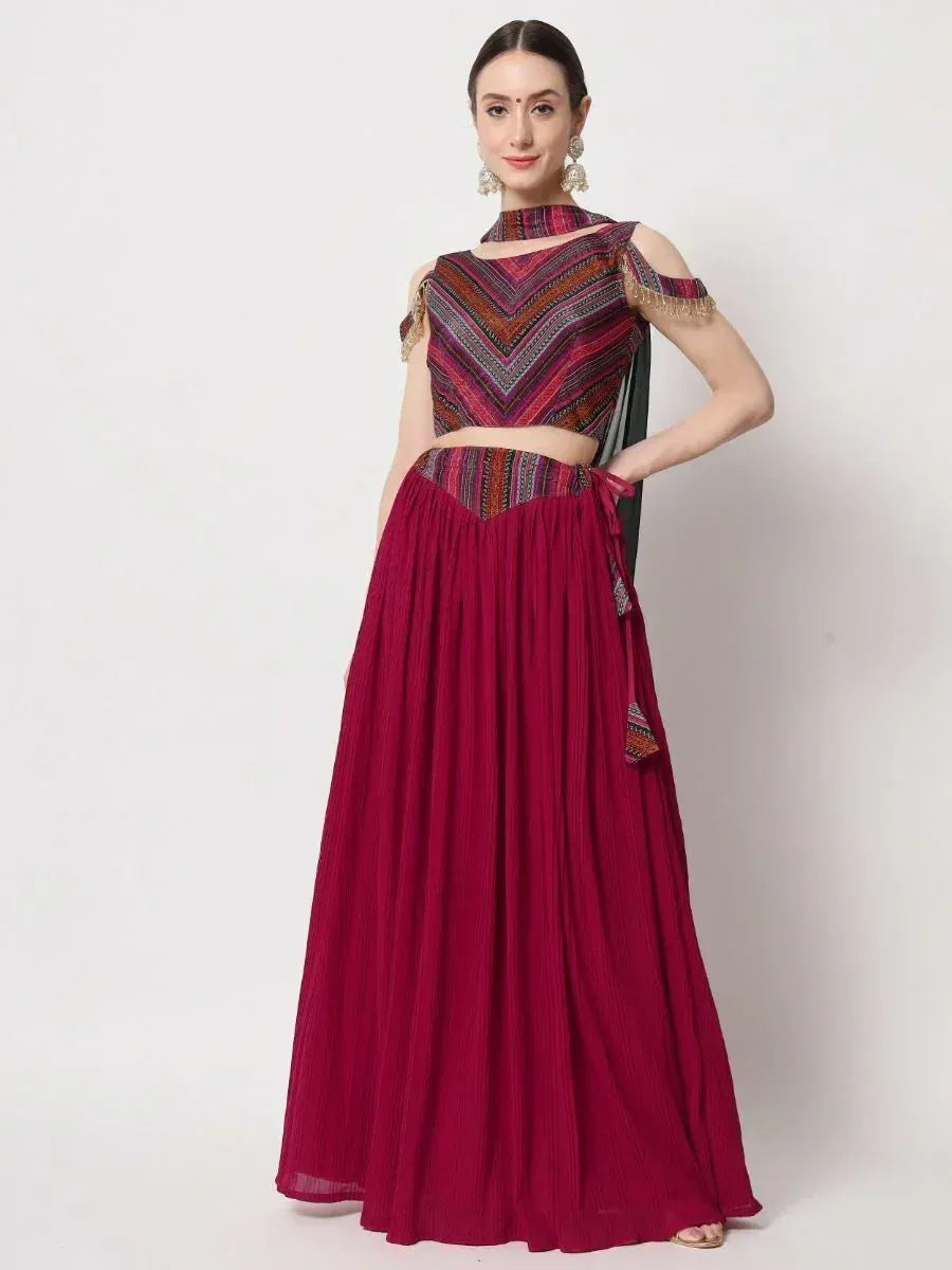 Maroon ethnic lehenga choli with geometric print top and pleated skirt, perfect for Indian occasions