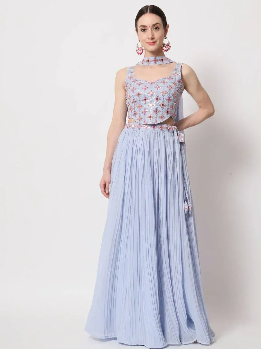 Light blue embroidered lehenga choli with pleated skirt and matching choker, ideal for Indian ethnic occasions