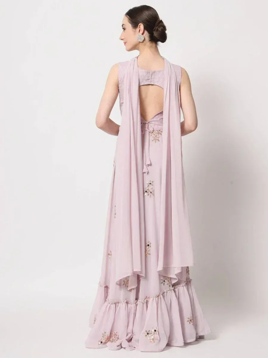 Elegant lavender ethnic gown with back cutout, floral embroidery, and ruffled hem for women