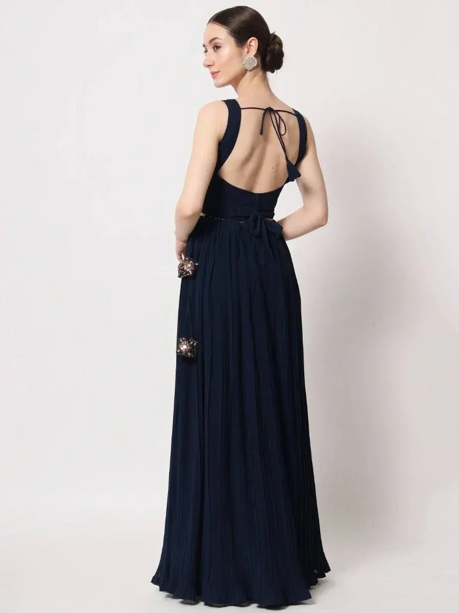 Navy blue ethnic gown with back tie and floral embellishments, perfect for Indian occasions