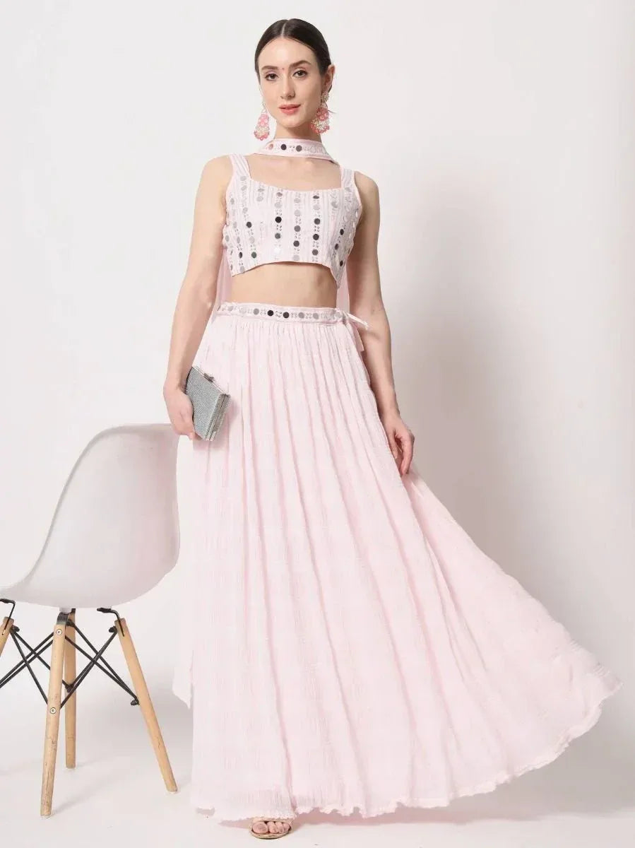 Pink pleated ethnic skirt with sequin top, perfect for Indian festive wear and designer occasions.