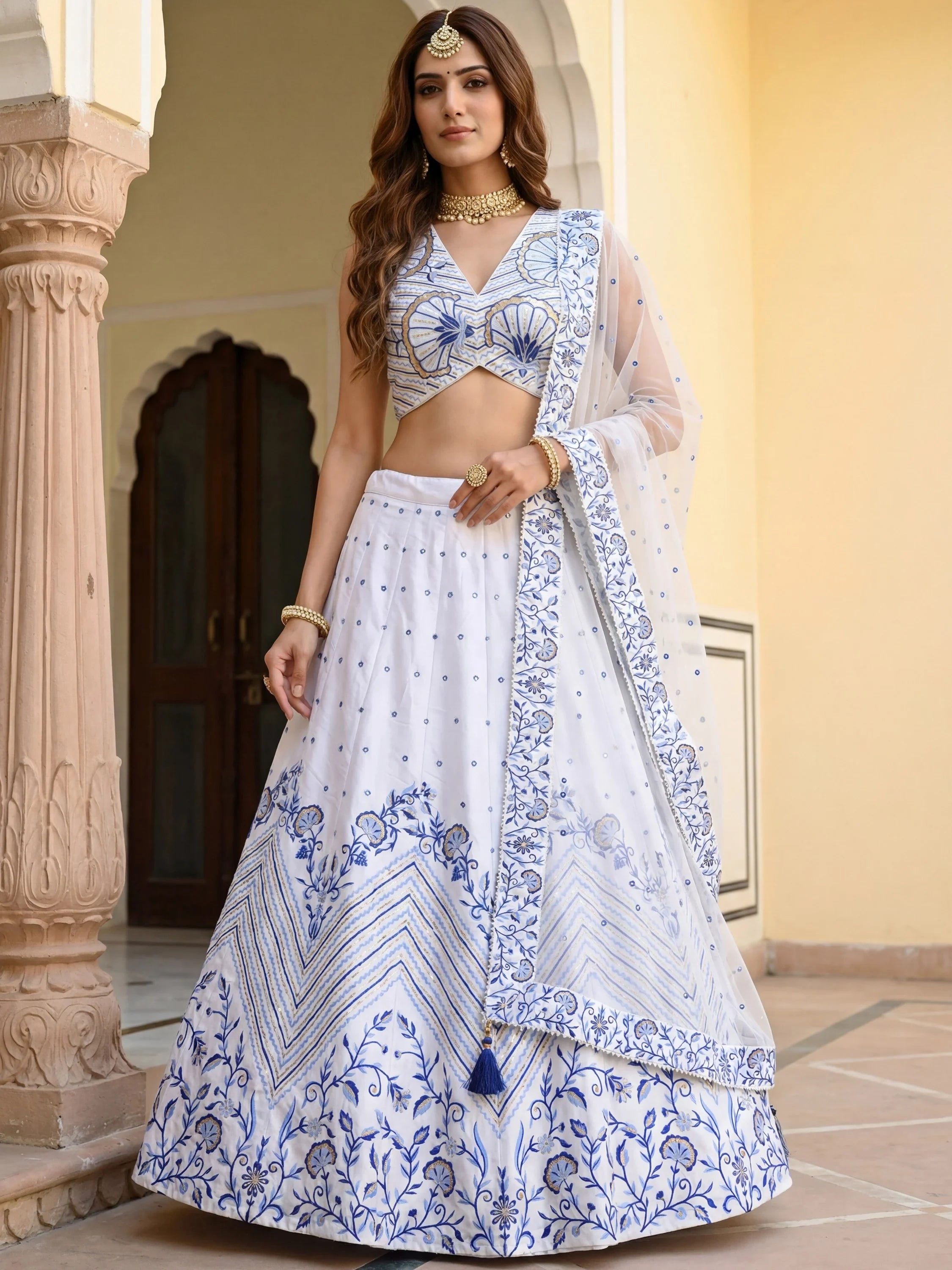 Awesome White Embroidered Satin Sangeet Wear Lehenga Choli