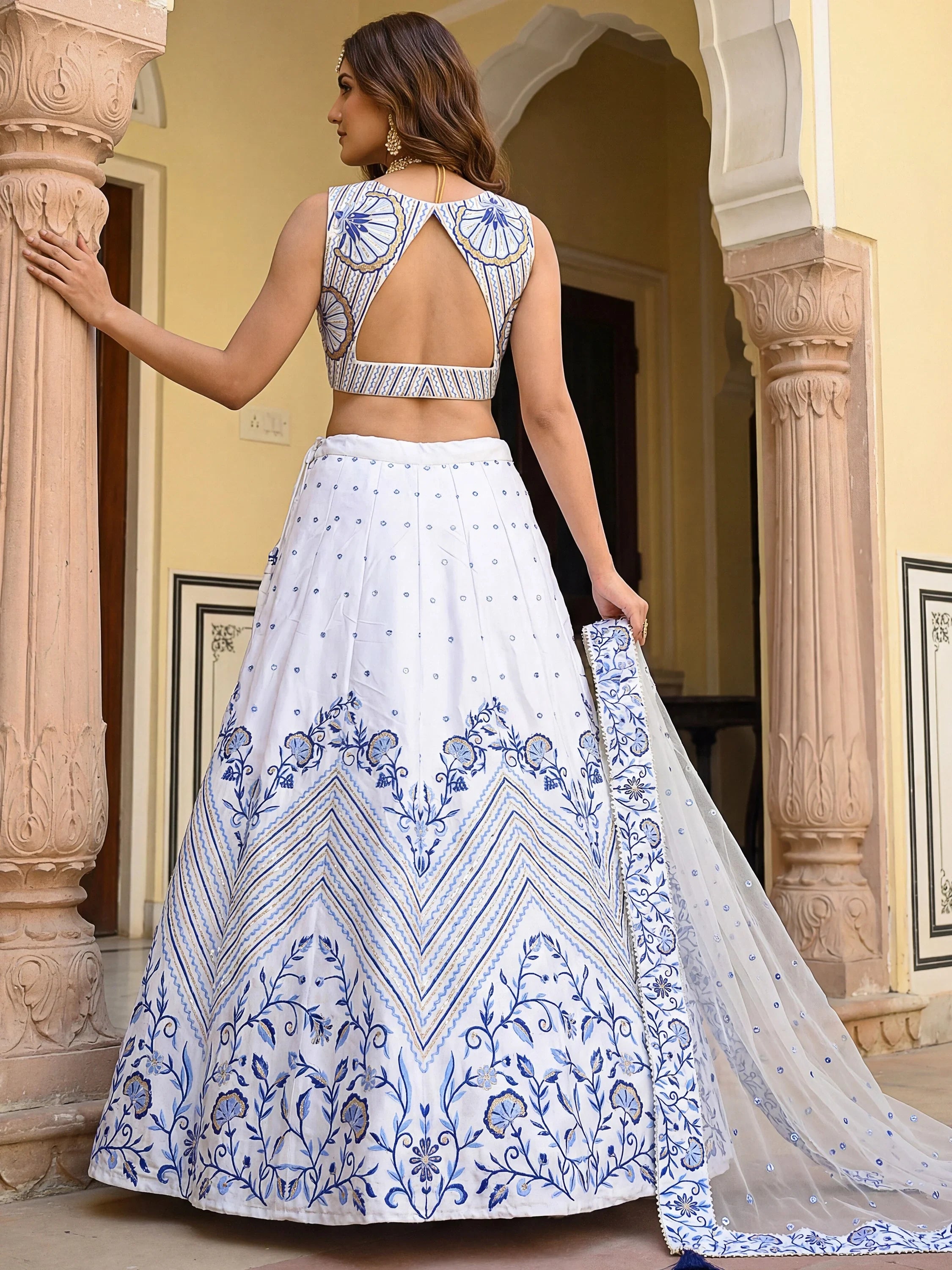 Awesome White Embroidered Satin Sangeet Wear Lehenga Choli
