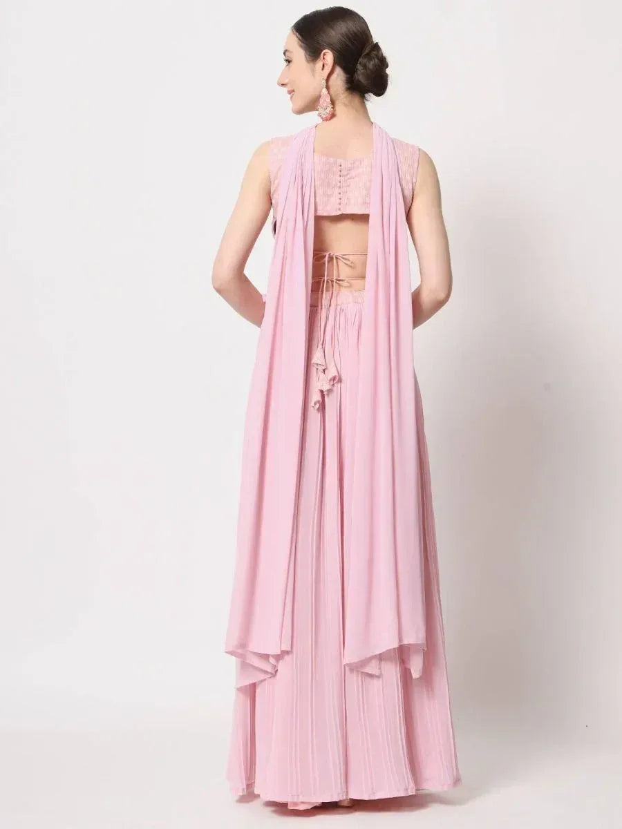 Pink ethnic palazzo set with crop top and draped dupatta, perfect for Indian occasions