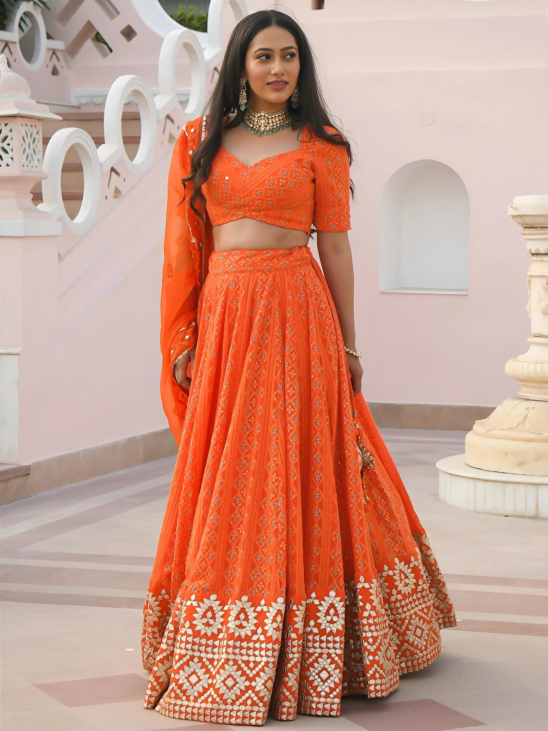 Pretty Orange Sequins Georgette Sangeet Wear Lehenga Choli