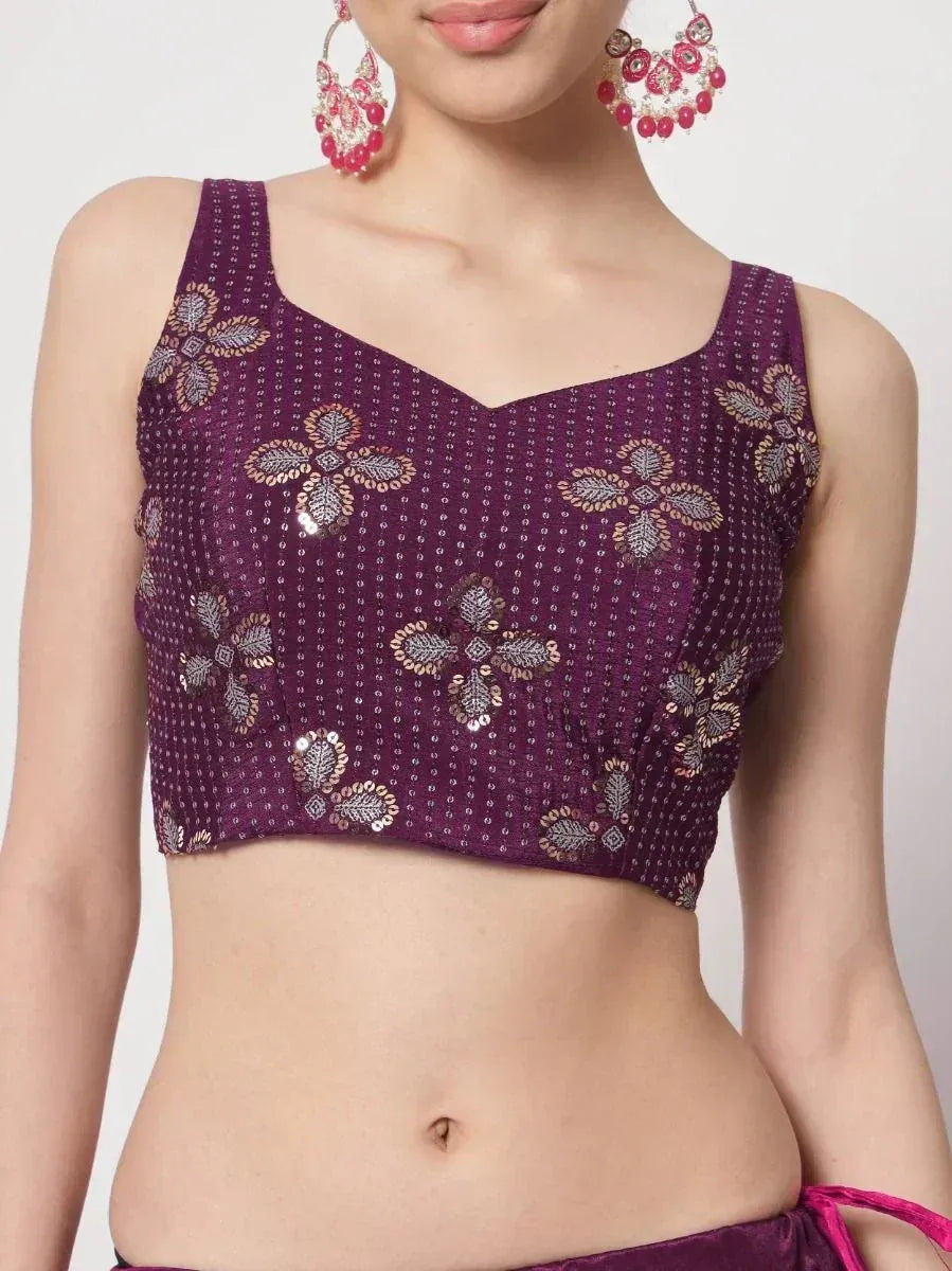 Purple embroidered lehenga choli blouse with floral sequin design and matching earrings