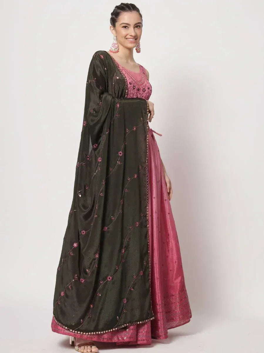 Pink and olive green embroidered lehenga choli with floral detailing, perfect for Indian ethnic occasions.