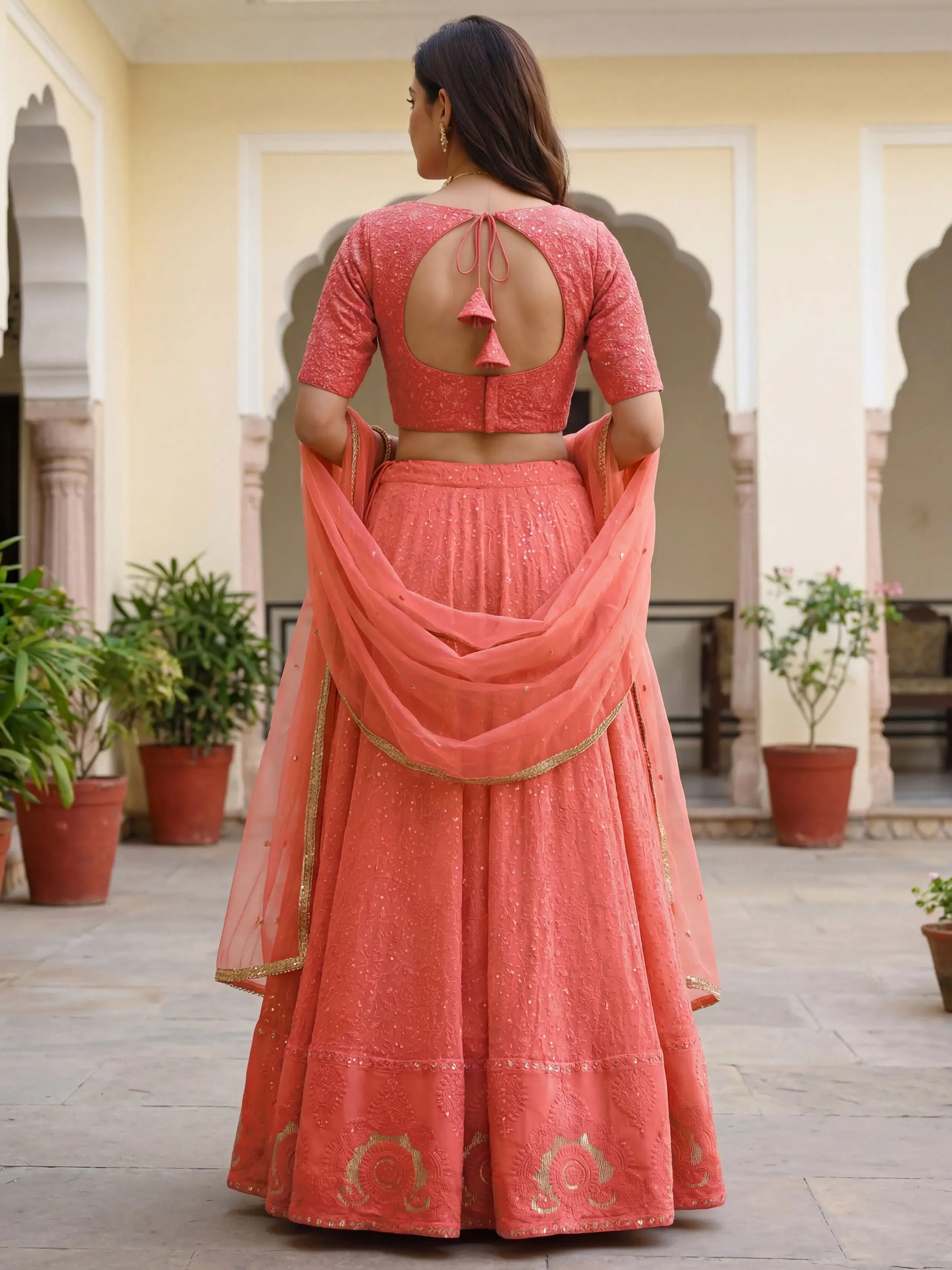 Impressive Peach Embroidered Georgette Festival Wear Lehenga Choli