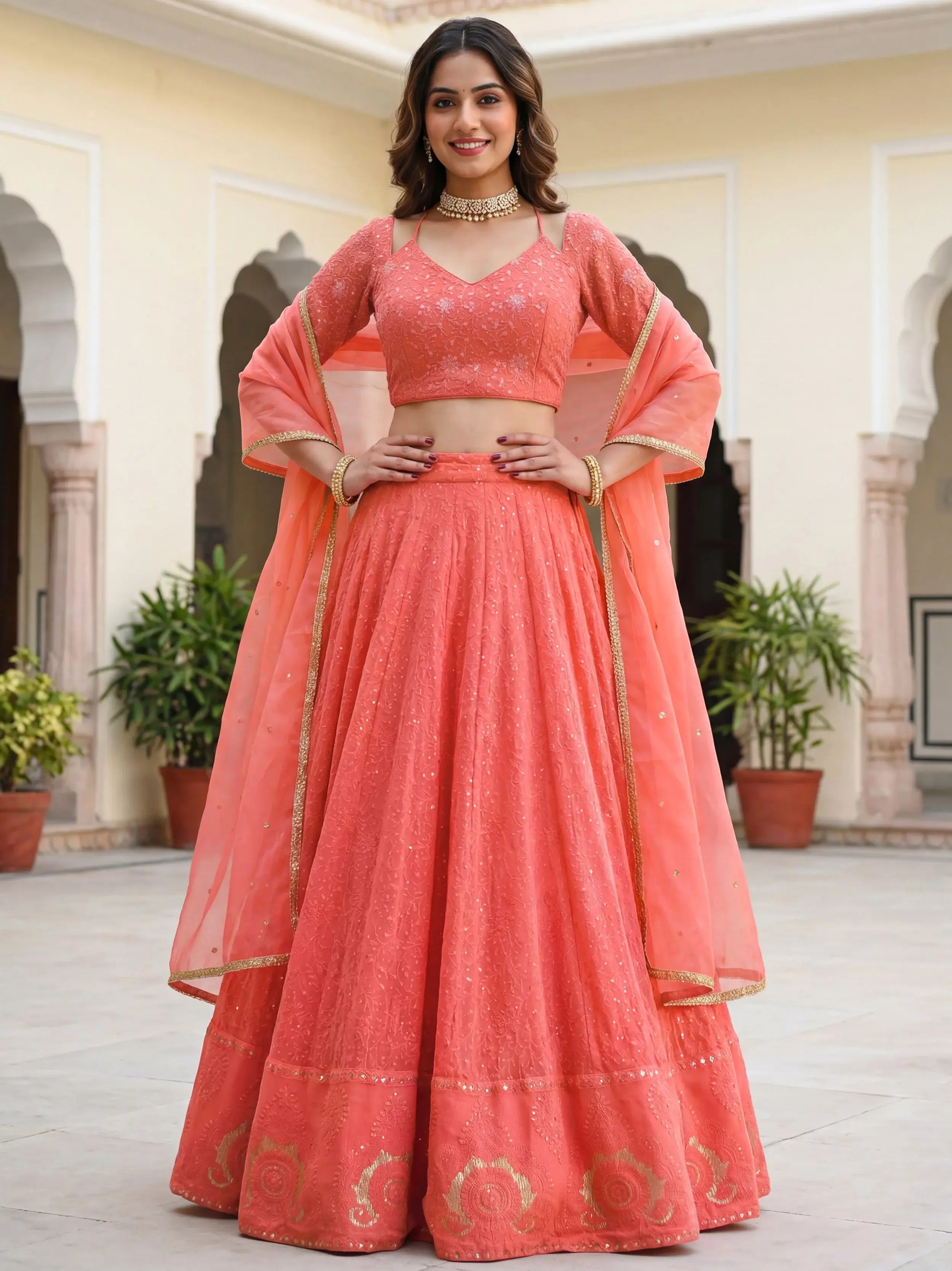 Impressive Peach Embroidered Georgette Festival Wear Lehenga Choli