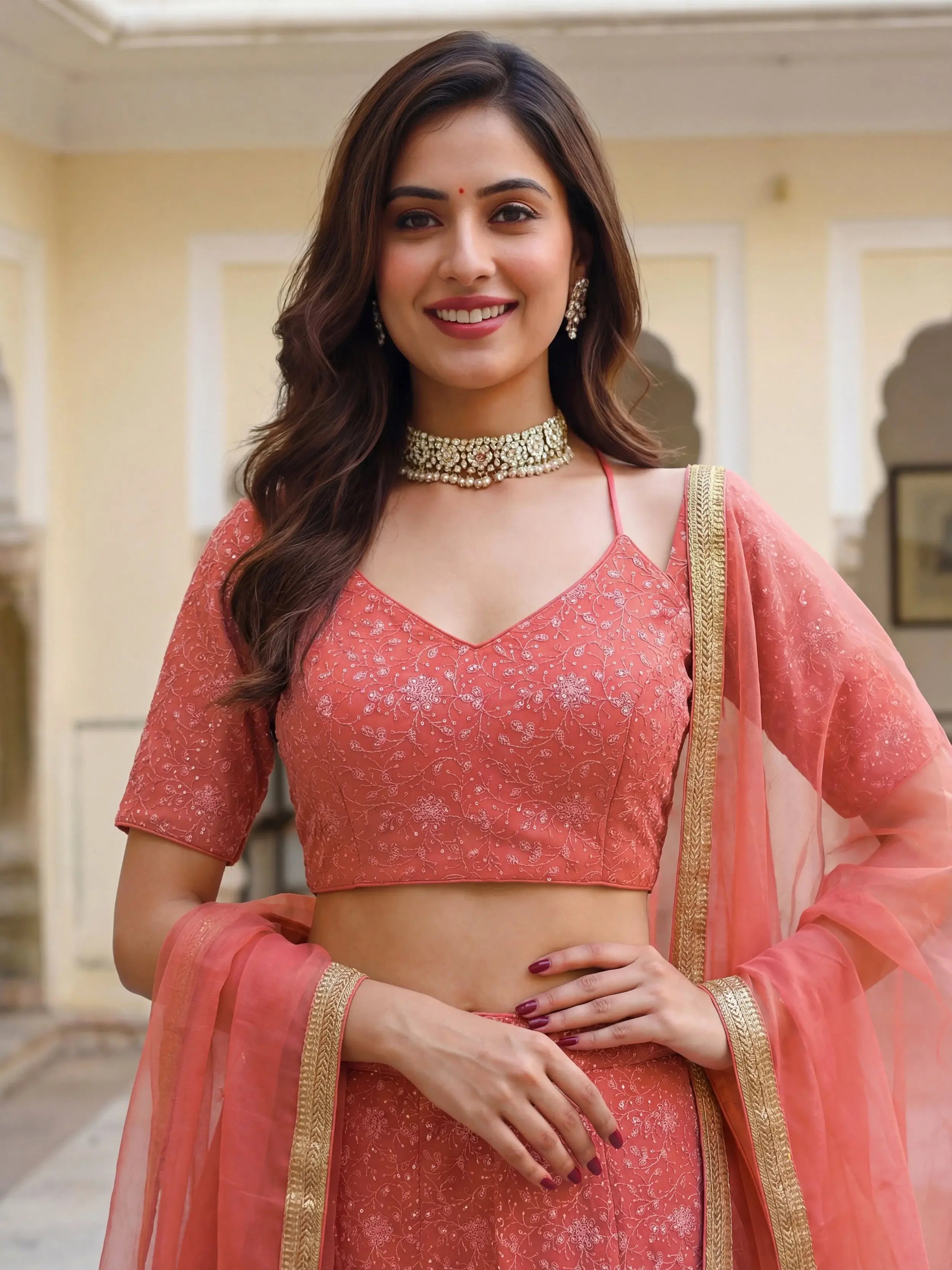 Impressive Peach Embroidered Georgette Festival Wear Lehenga Choli