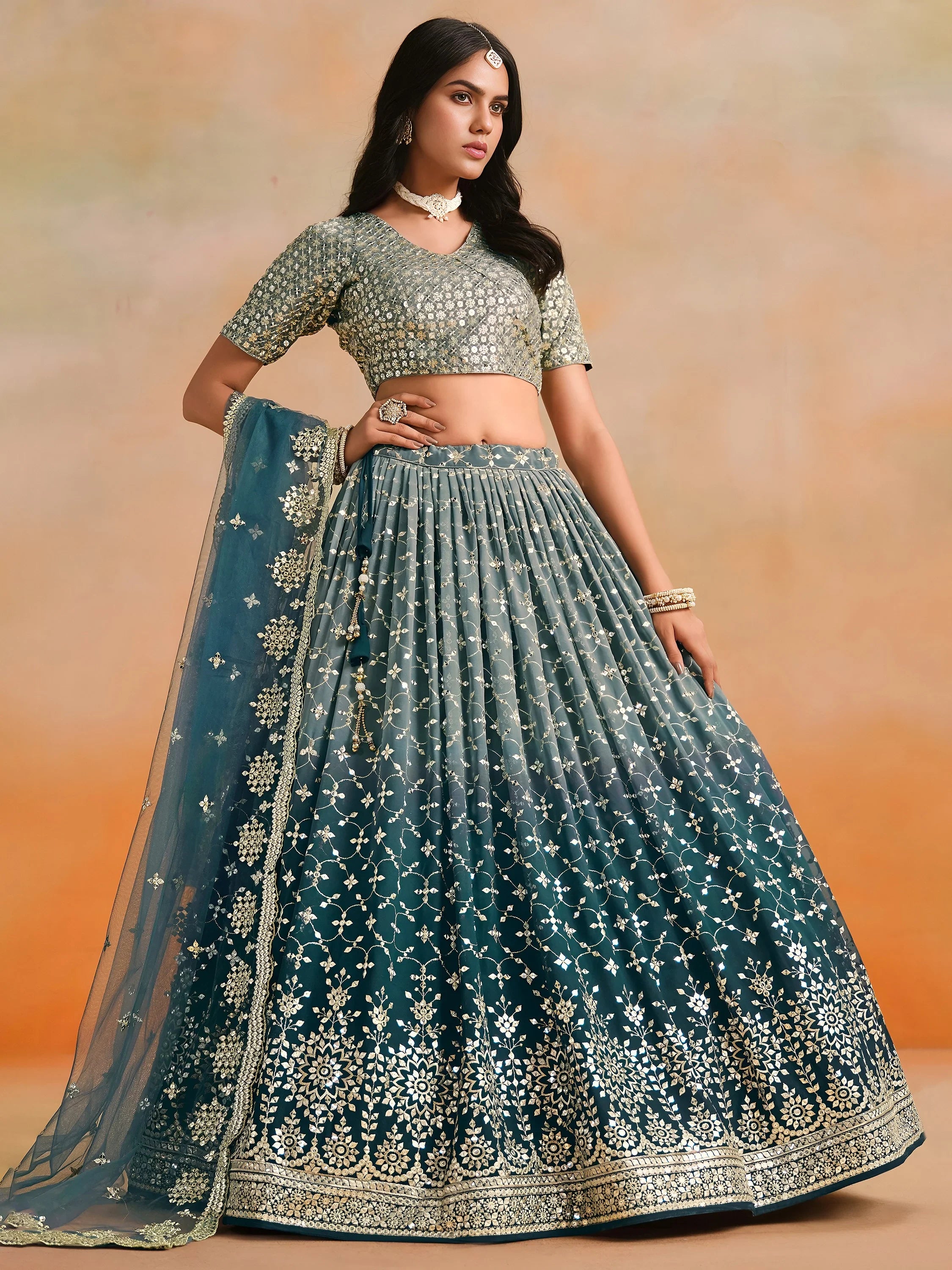 Glamorous Dove Blue Sequins Embroidered Georgette Lehenga Choli