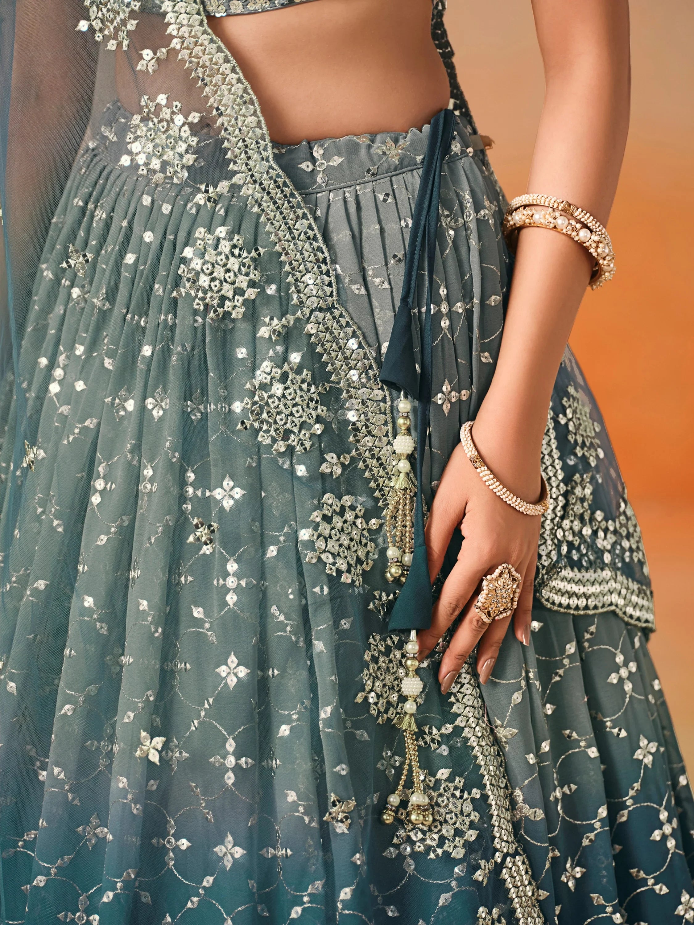 Glamorous Dove Blue Sequins Embroidered Georgette Lehenga Choli