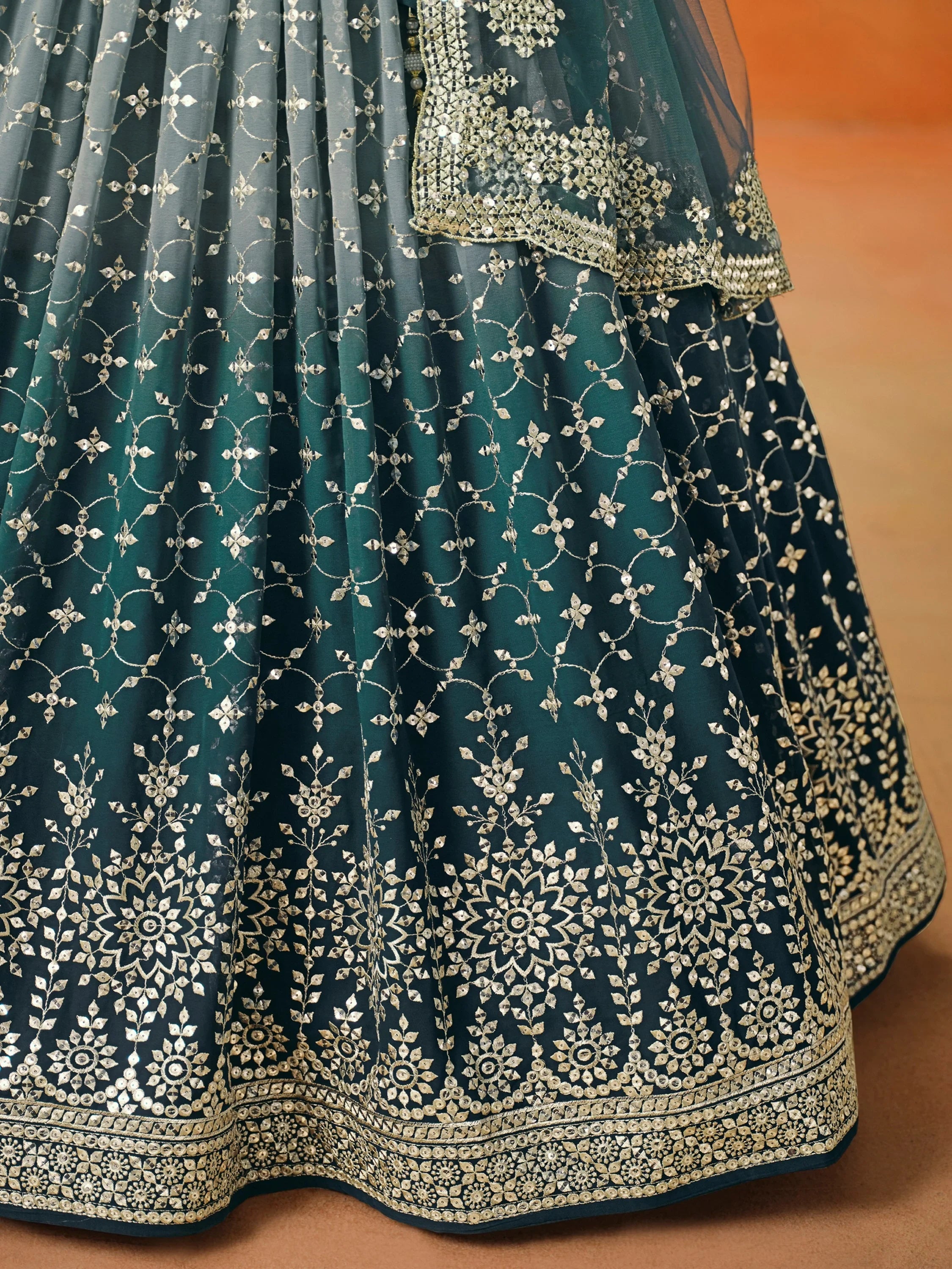 Glamorous Dove Blue Sequins Embroidered Georgette Lehenga Choli
