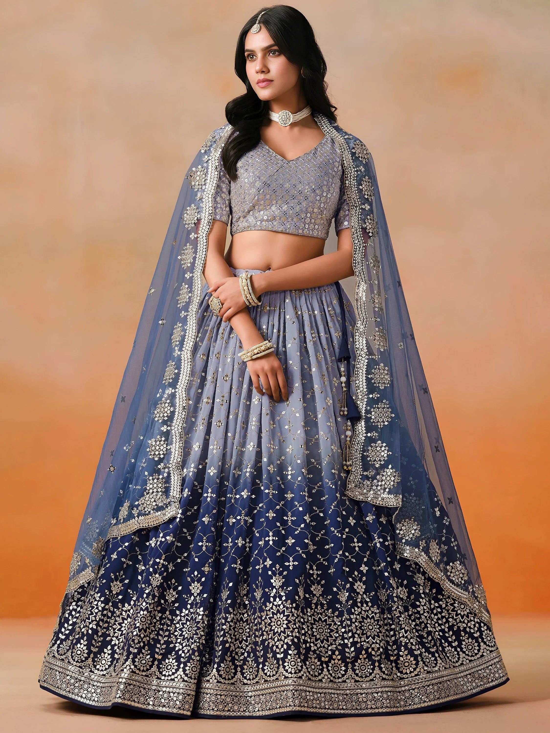 Attractive Navy Blue Embroidered Reception Wear Lehenga Choli