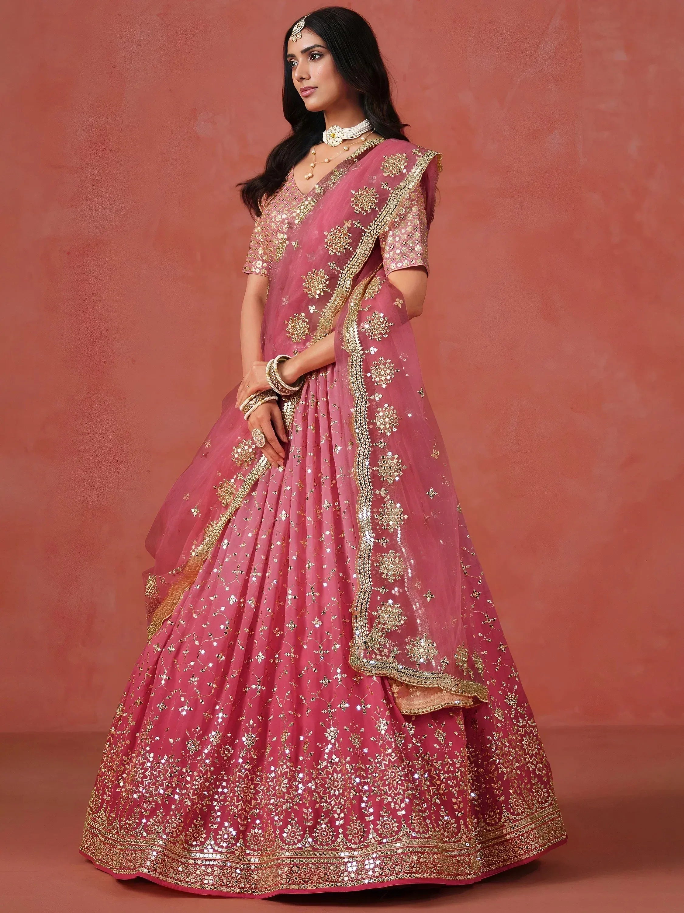 Stunning Peach Georgette Sequins Lehenga Choli
