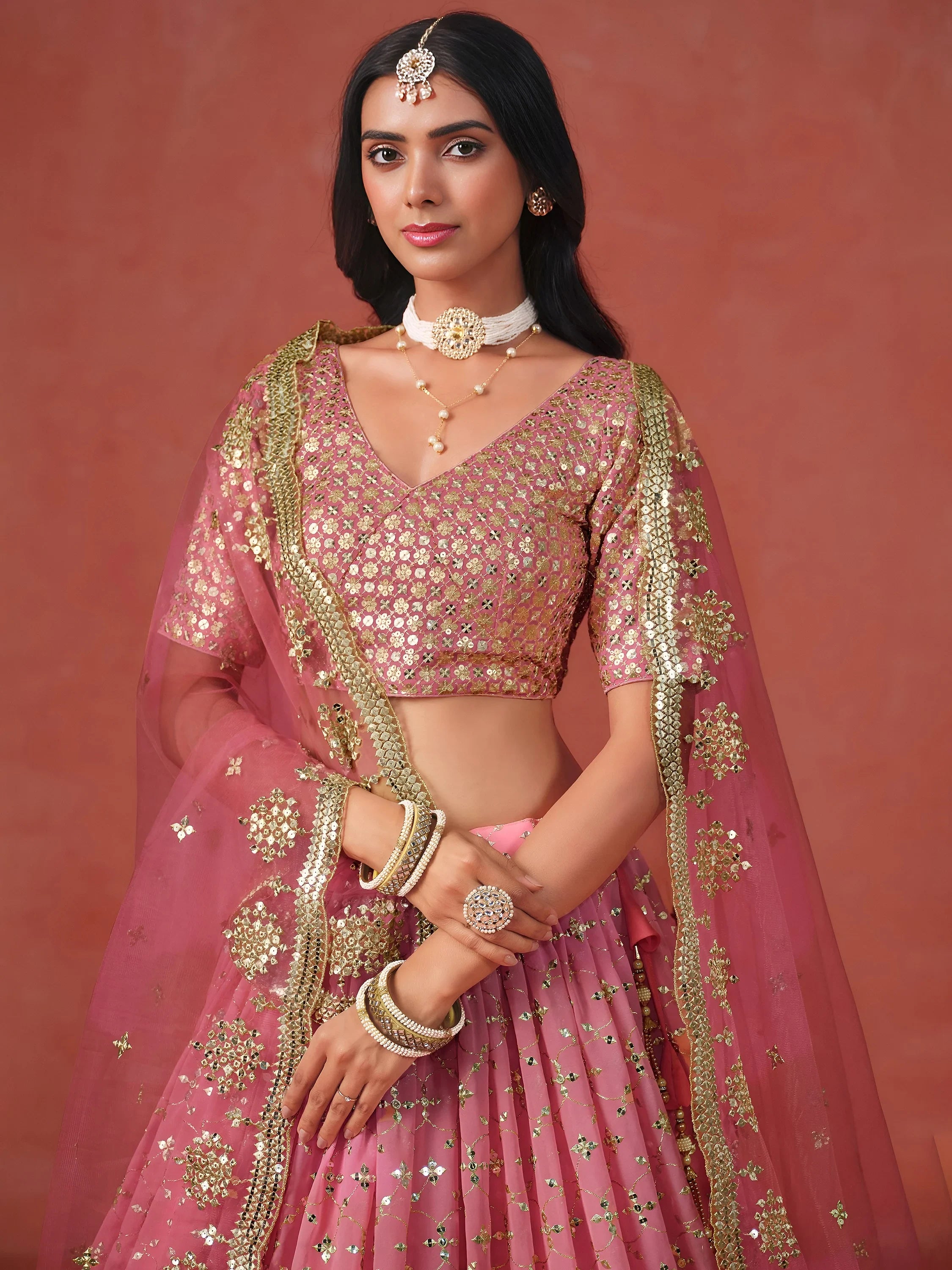 Stunning Peach Georgette Sequins Lehenga Choli