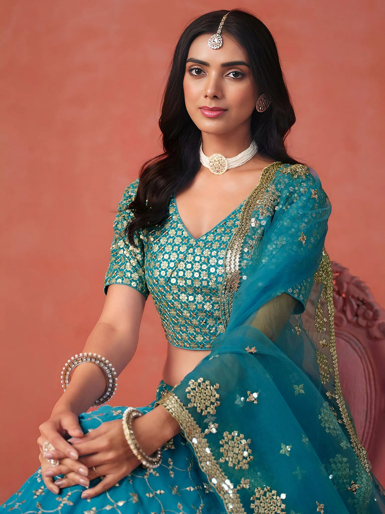Adorable Teal Blue Georgette Zari Embroidered Lehenga Choli