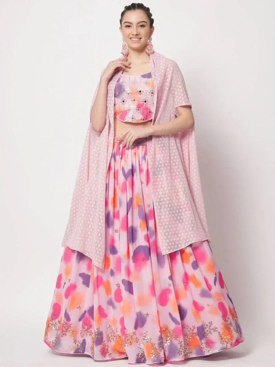 Pink floral lehenga choli with embroidered crop top and sheer cape, perfect for Indian ethnic occasions
