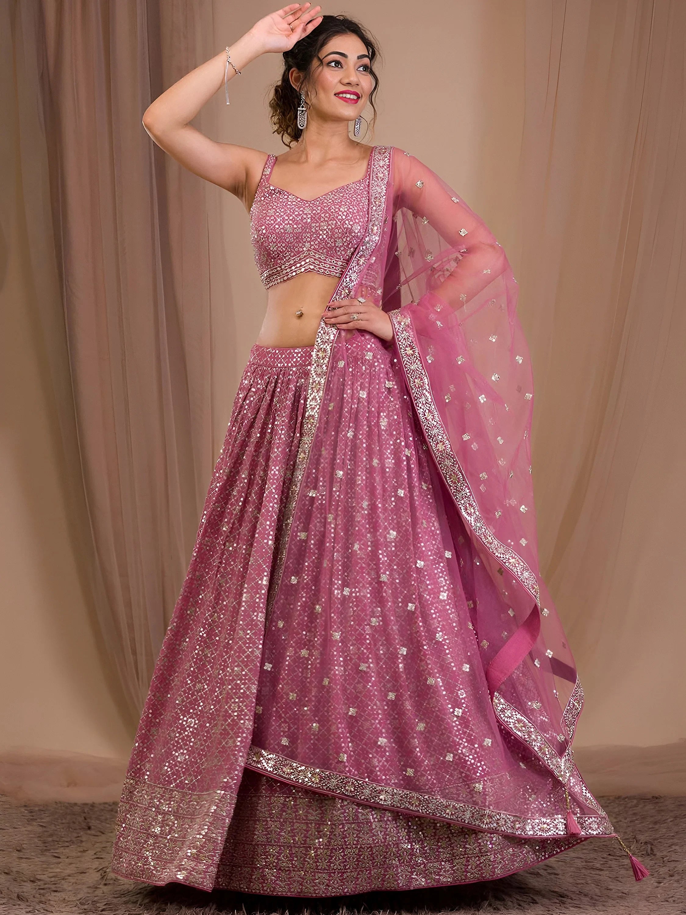 Alluring Pink Sequins Georgette Engagement Wear Lehenga Choli