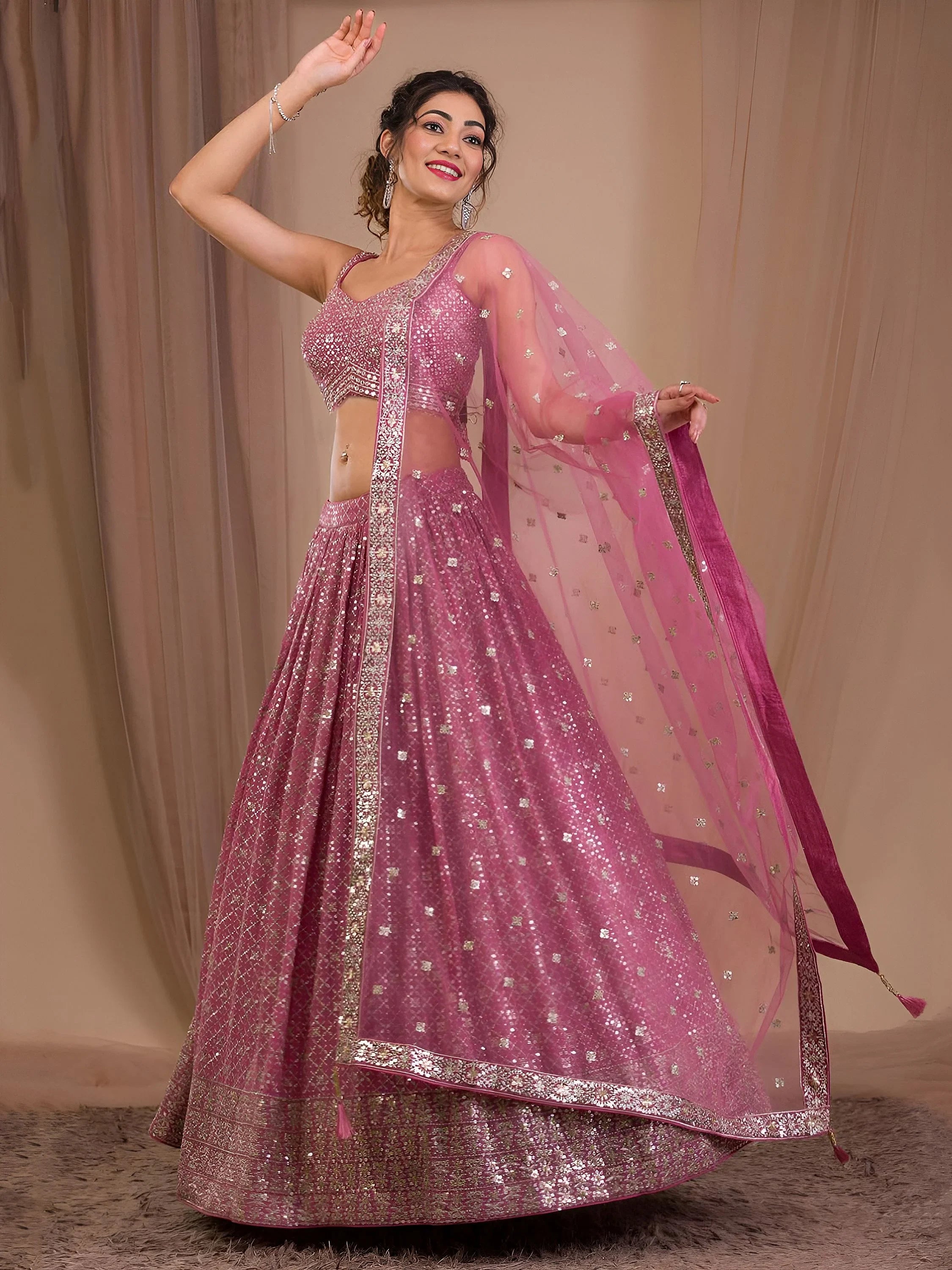 Alluring Pink Sequins Georgette Engagement Wear Lehenga Choli