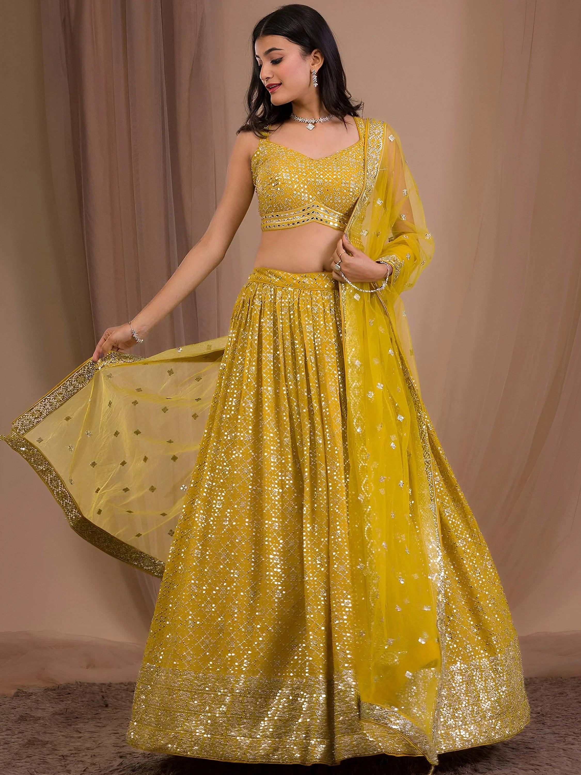 Fascinating Yellow Sequins Georgette Haldi Wear Lehenga Choli
