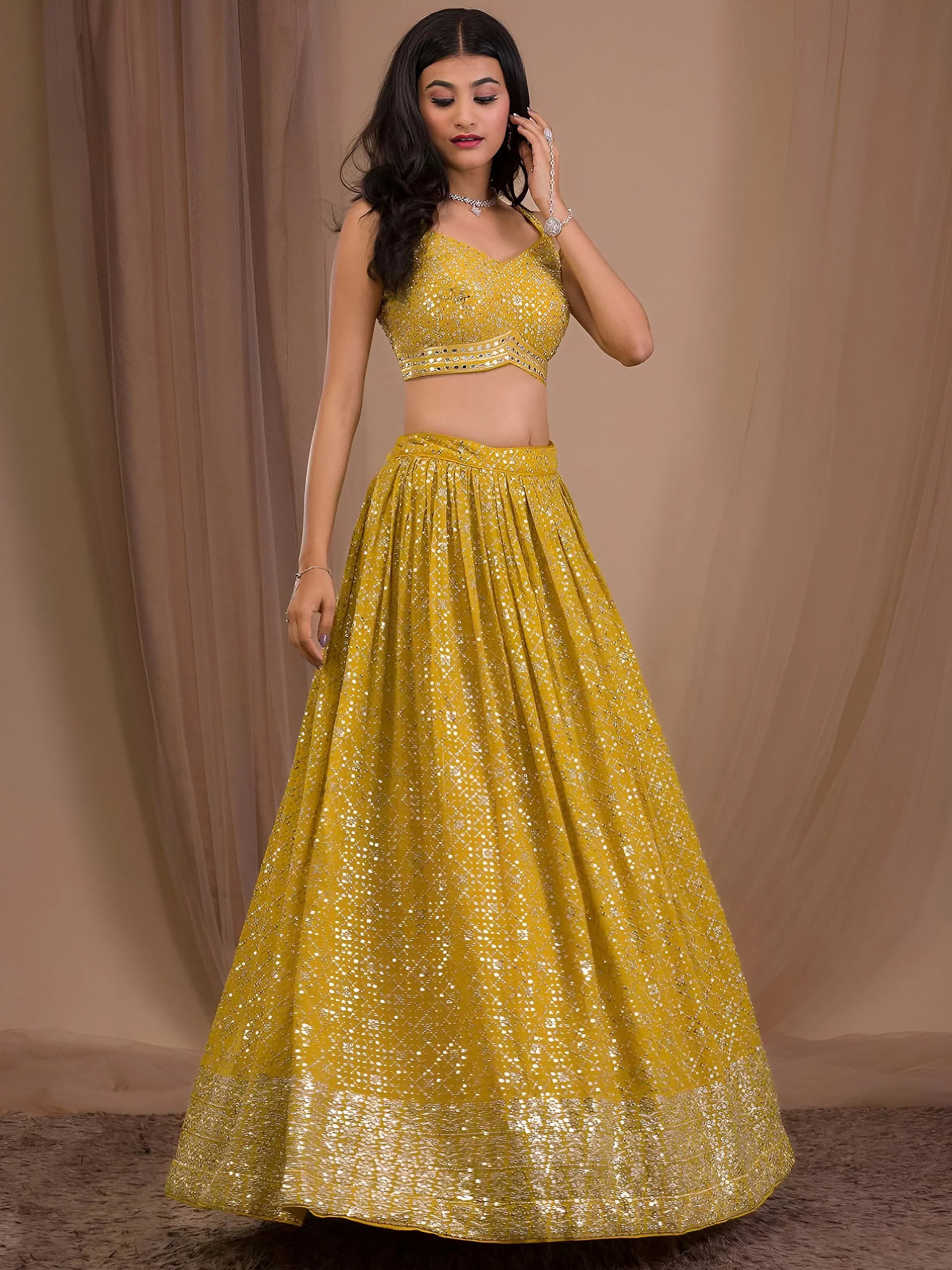 Fascinating Yellow Sequins Georgette Haldi Wear Lehenga Choli