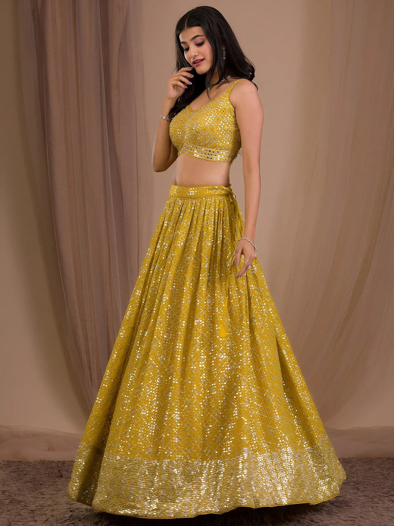 Fascinating Yellow Sequins Georgette Haldi Wear Lehenga Choli