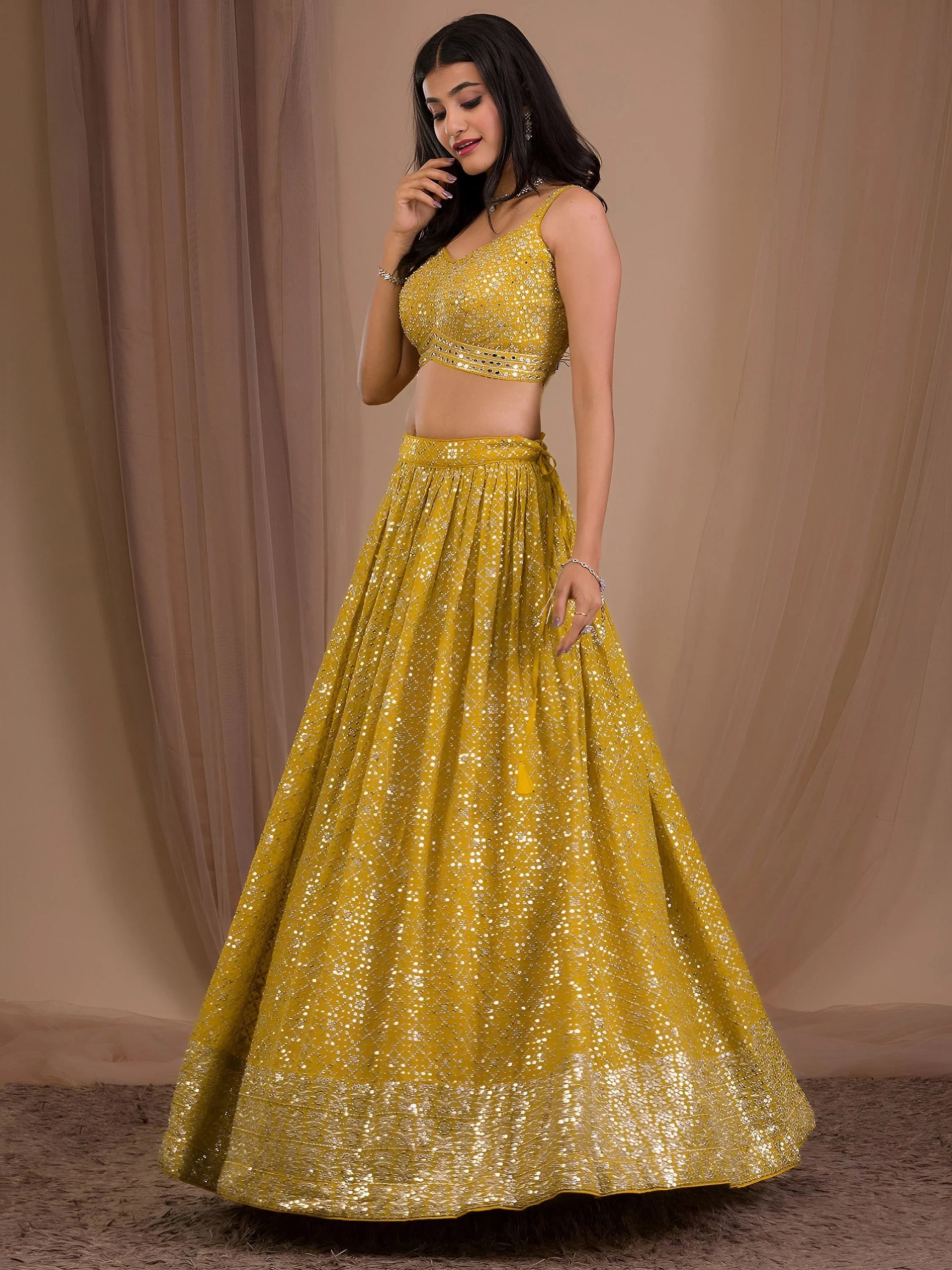 Fascinating Yellow Sequins Georgette Haldi Wear Lehenga Choli
