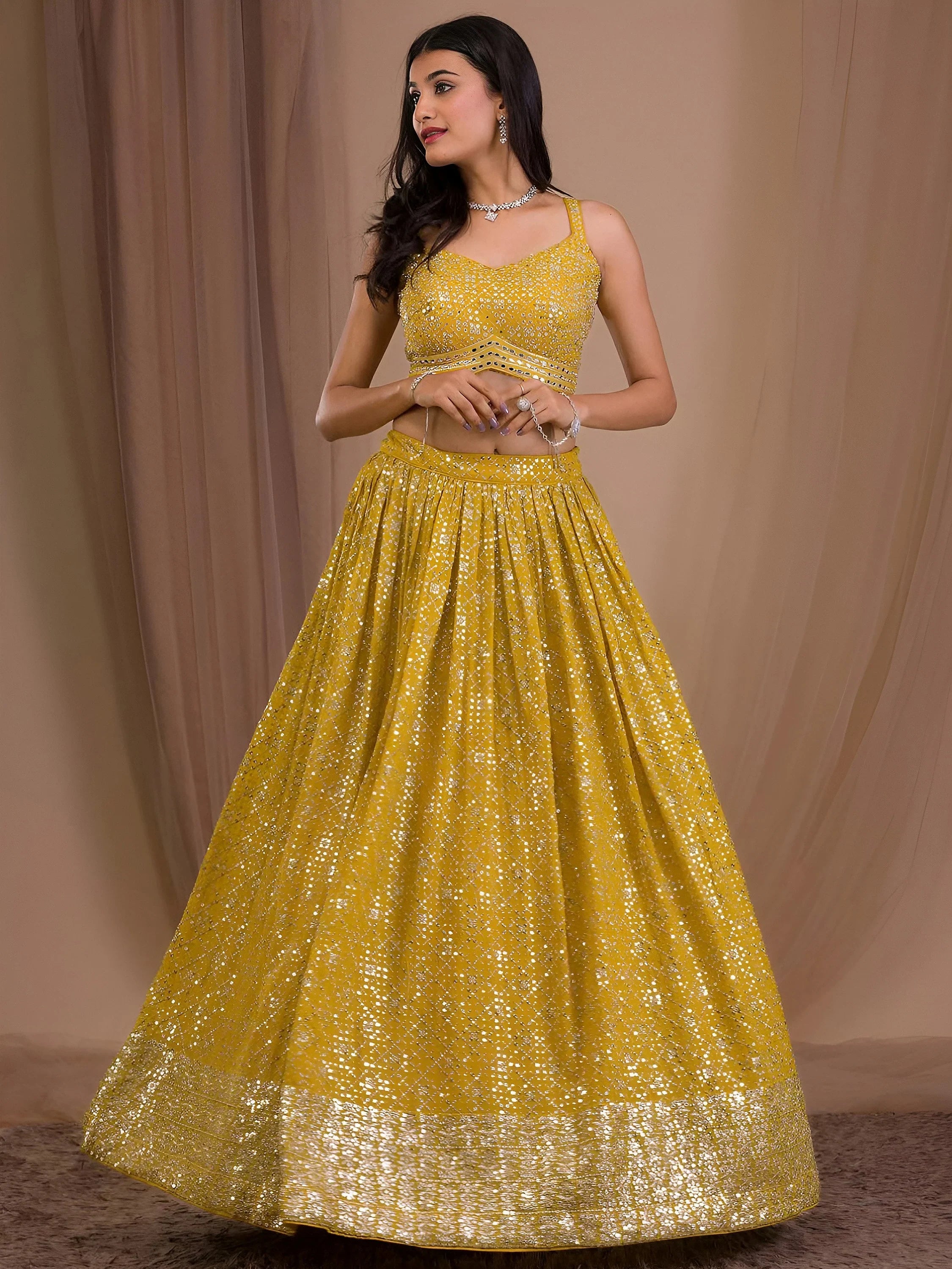 Fascinating Yellow Sequins Georgette Haldi Wear Lehenga Choli