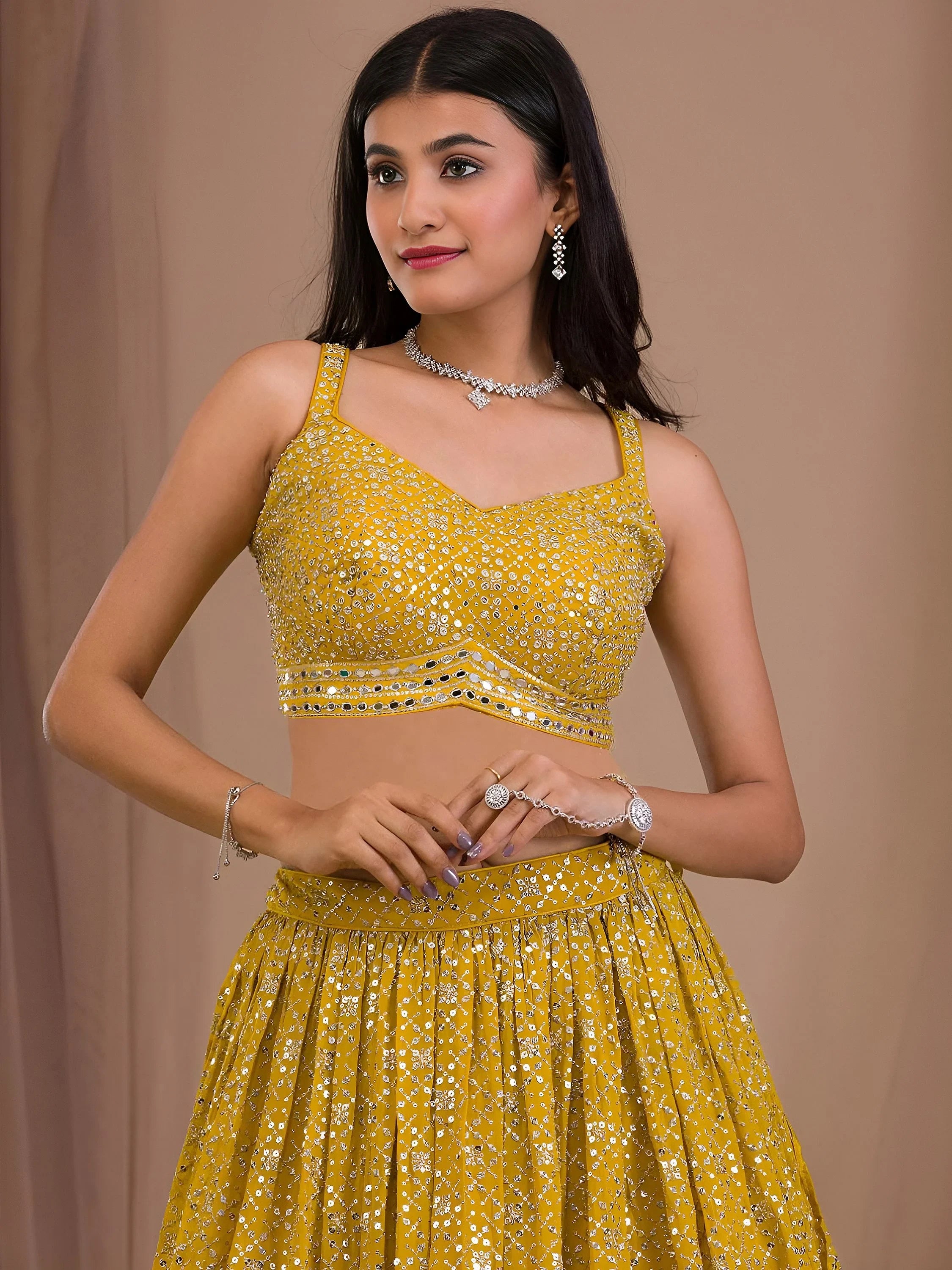 Fascinating Yellow Sequins Georgette Haldi Wear Lehenga Choli