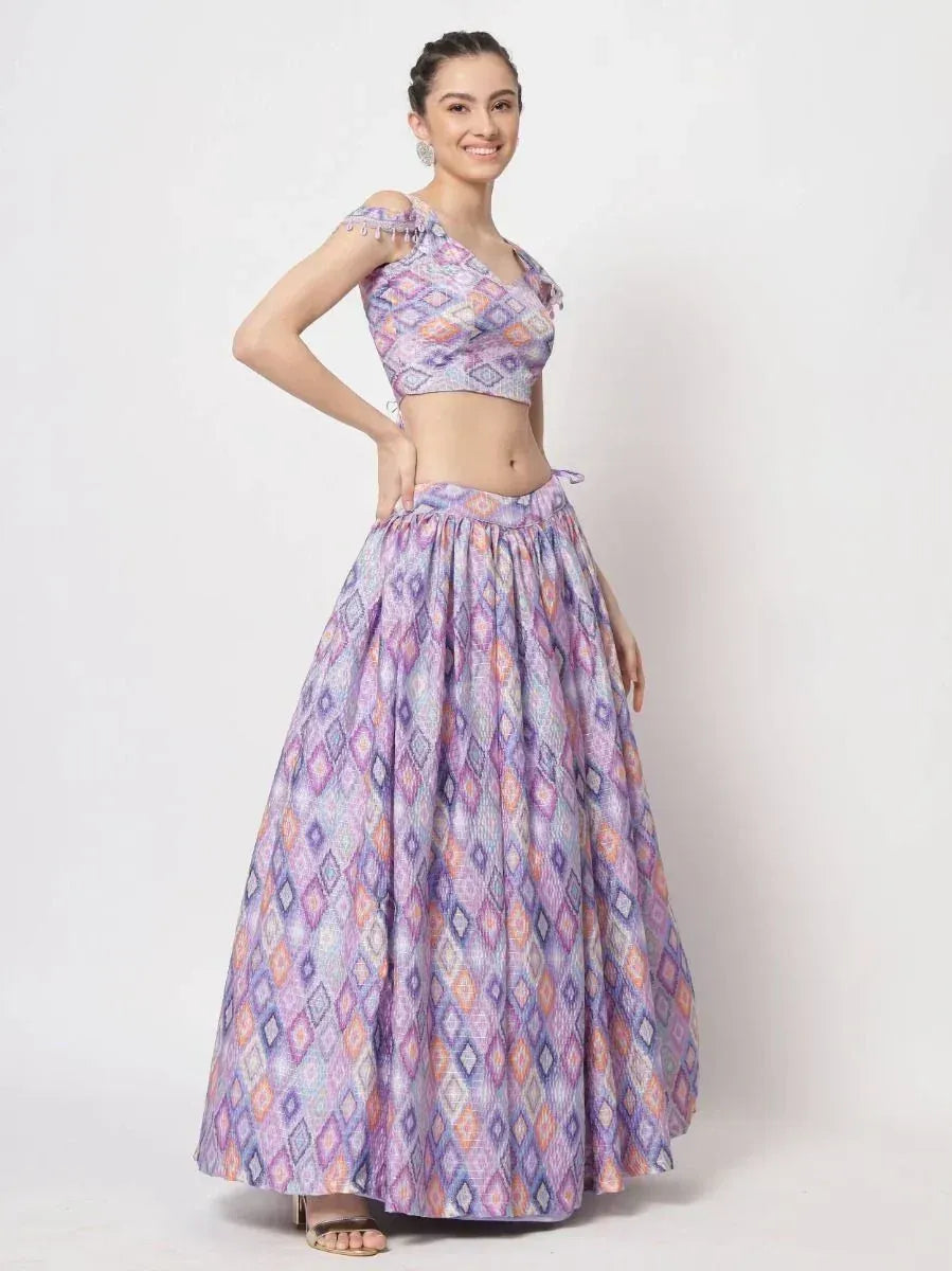 Purple geometric print lehenga choli with off-shoulder crop top, perfect for ethnic occasions