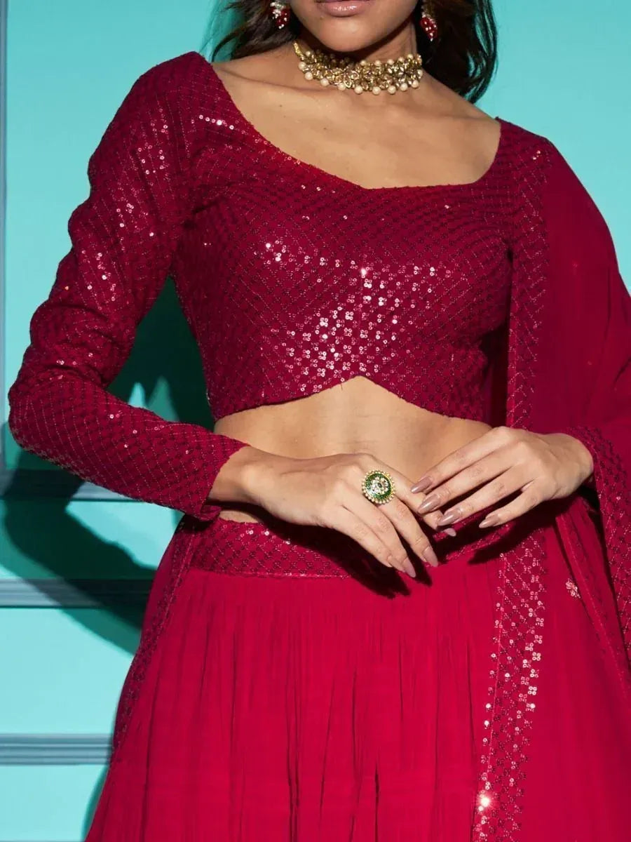 Red sequin lehenga choli with long sleeves, perfect for Indian ethnic wear and festive occasions