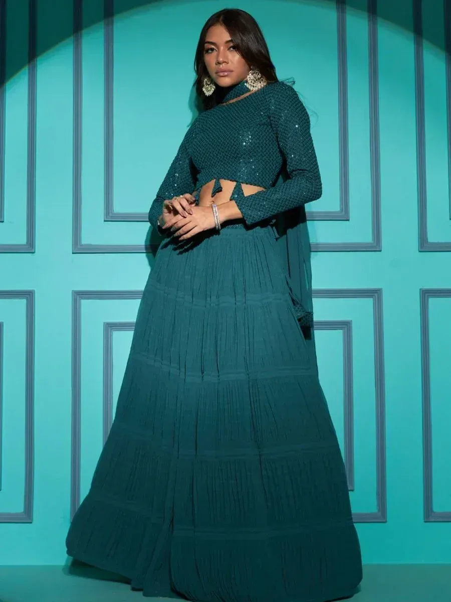 Teal sequin lehenga choli with layered skirt, perfect for Indian ethnic wear events