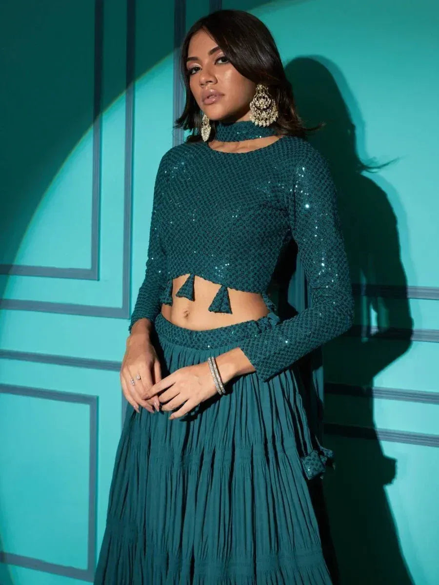 Teal sequin lehenga choli with cutout top and pleated skirt, ethnic Indian wear
