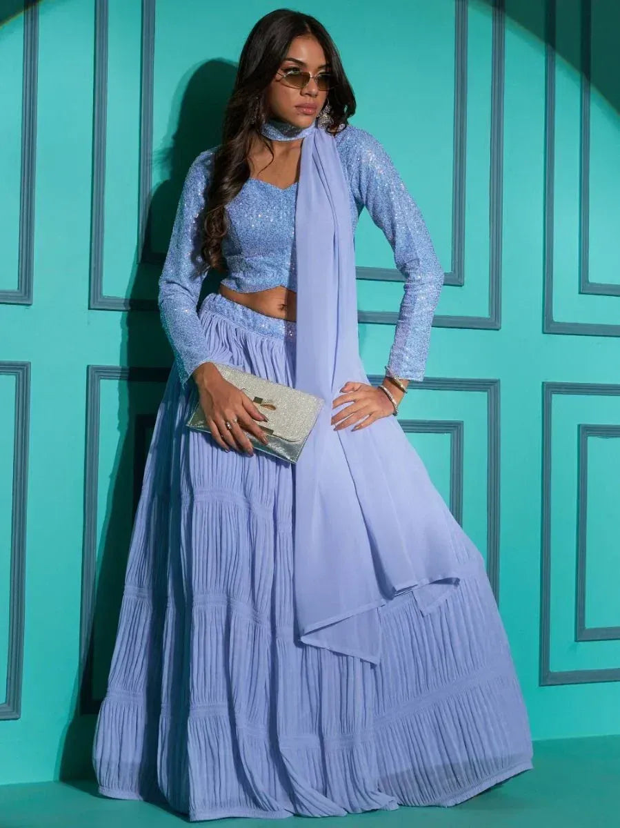 Light blue sequin lehenga choli with pleated skirt and matching dupatta, perfect for Indian ethnic events