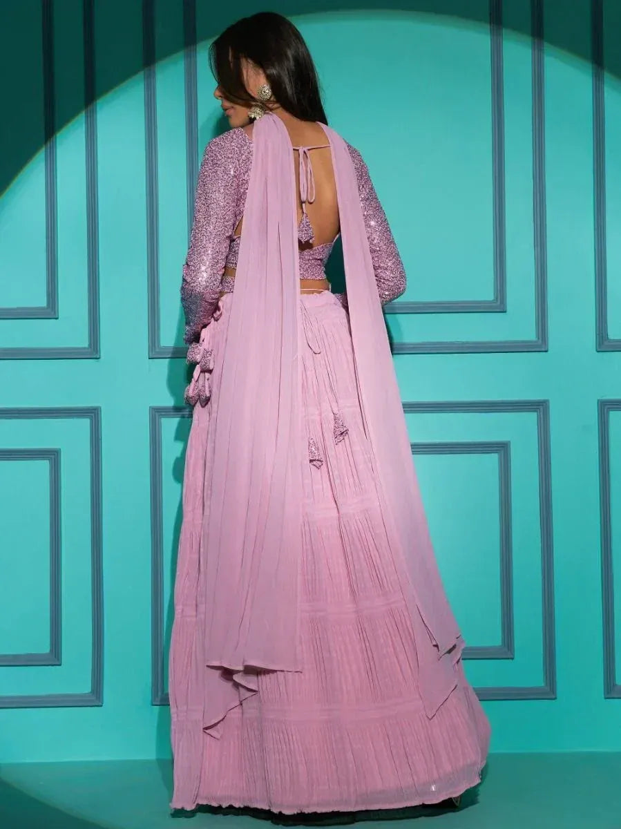 Pink sequin lehenga choli with back tie and pleated skirt, ethnic Indian wear