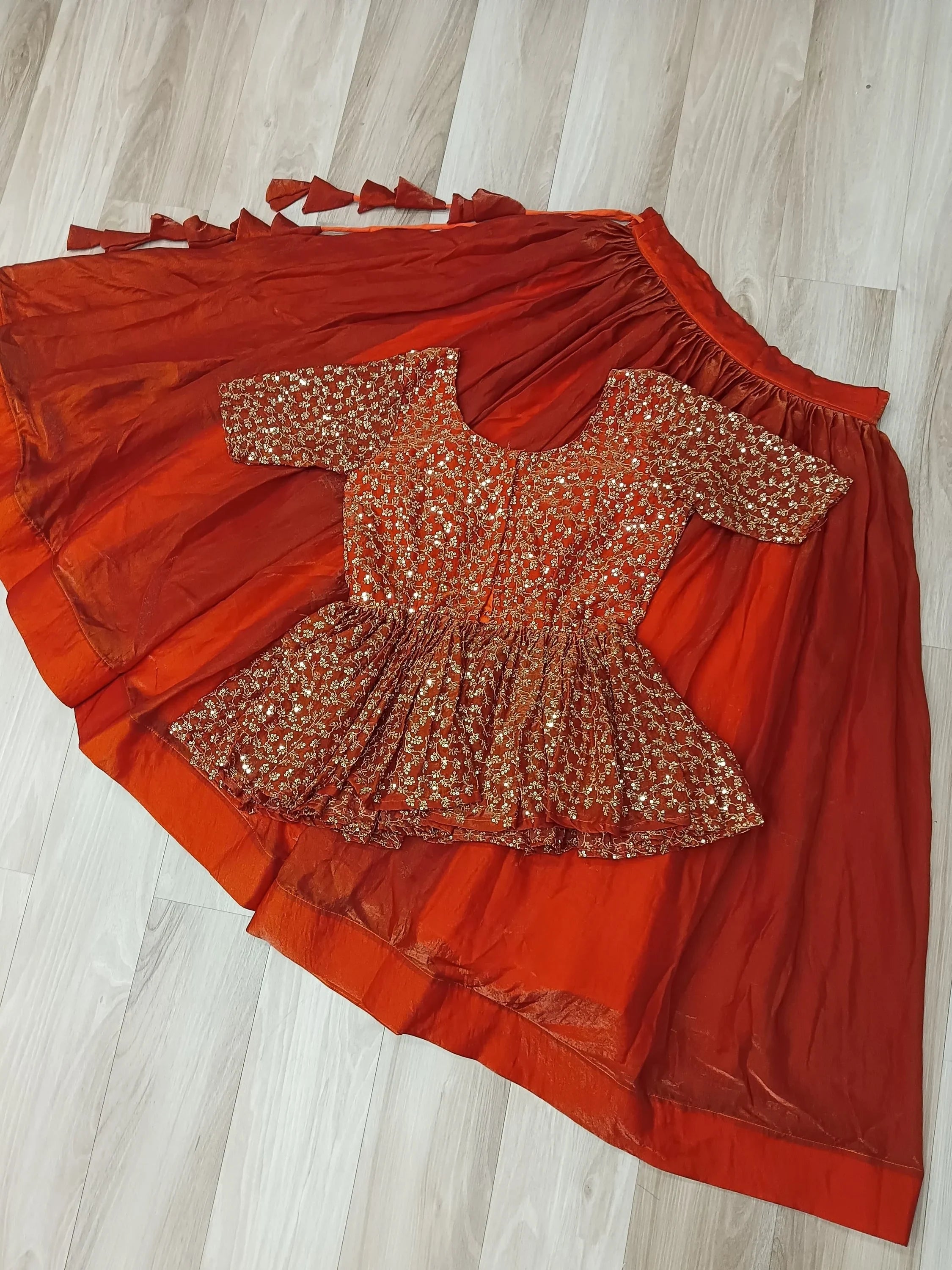 Impressive Orange Silk Function Wear Lehenga With Peplum Top