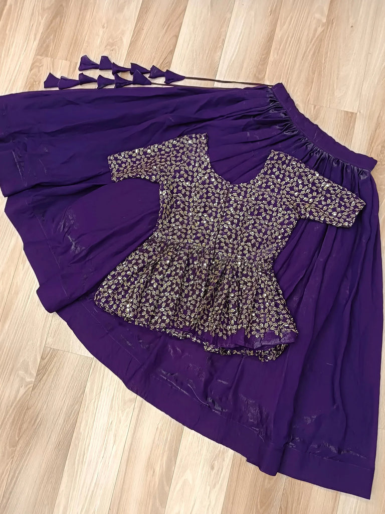 Fascinating Purple Silk Embroidered Peplum Top With Lehenga