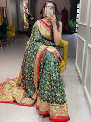 Fascinating Dark Green Patola Print Silk Festival Wear Saree With Blouse