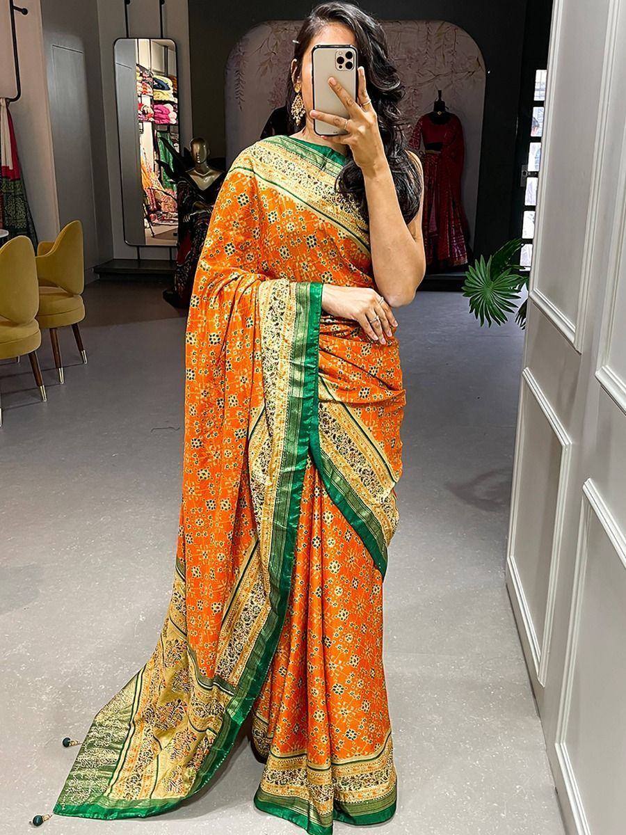 Orange floral saree with green border, stylish ethnic wear for women