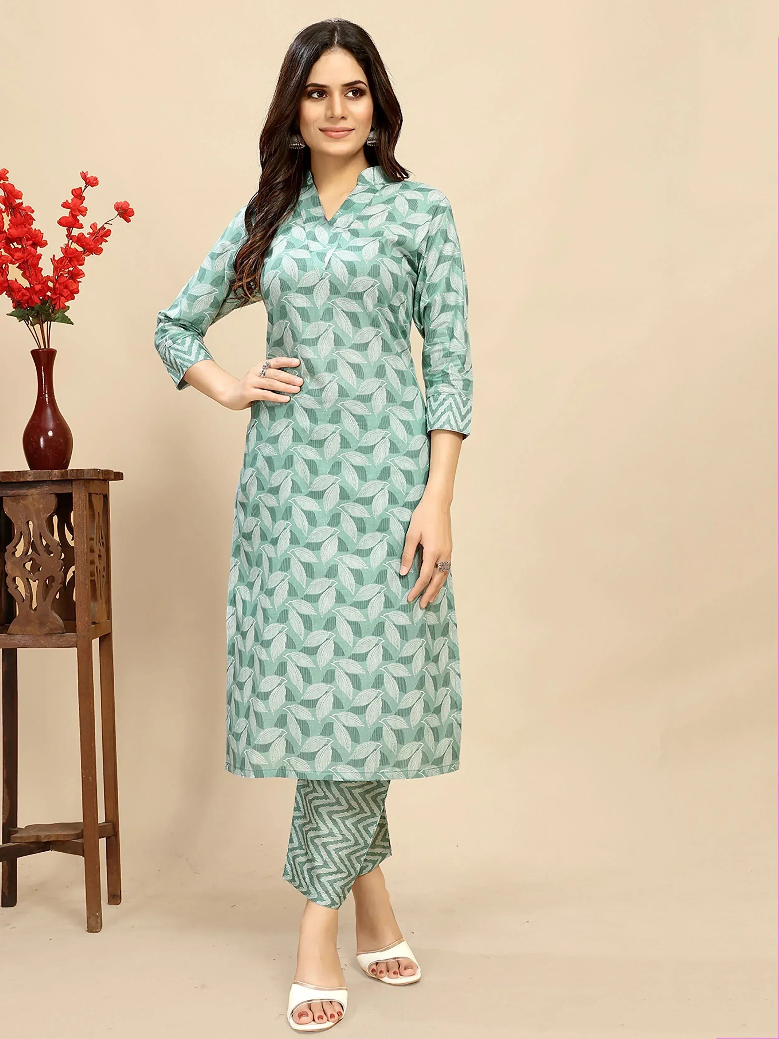 Woman in mint green leaf-print kurta with matching palazzo pants, ethnic wear outfit