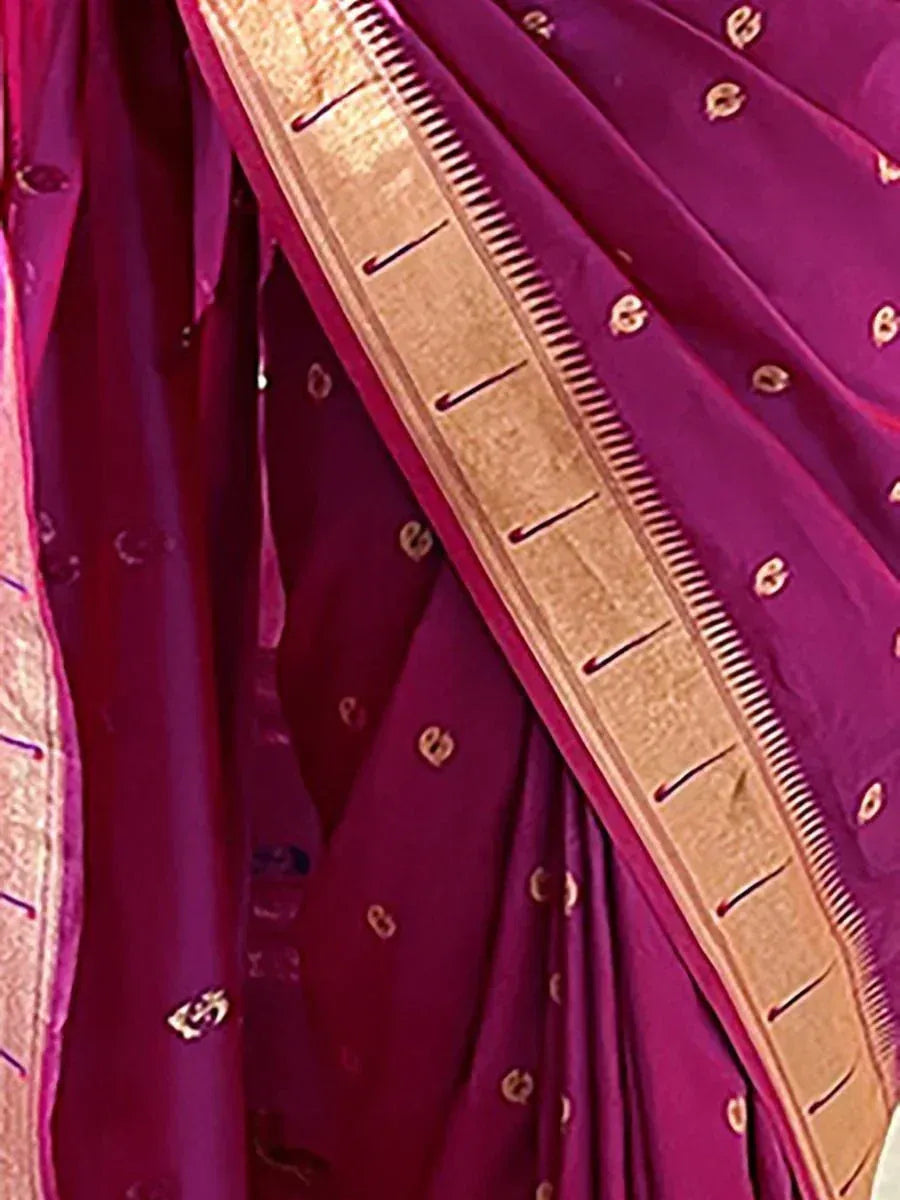 Rich purple saree with gold zari border and intricate embroidery, perfect for ethnic occasions
