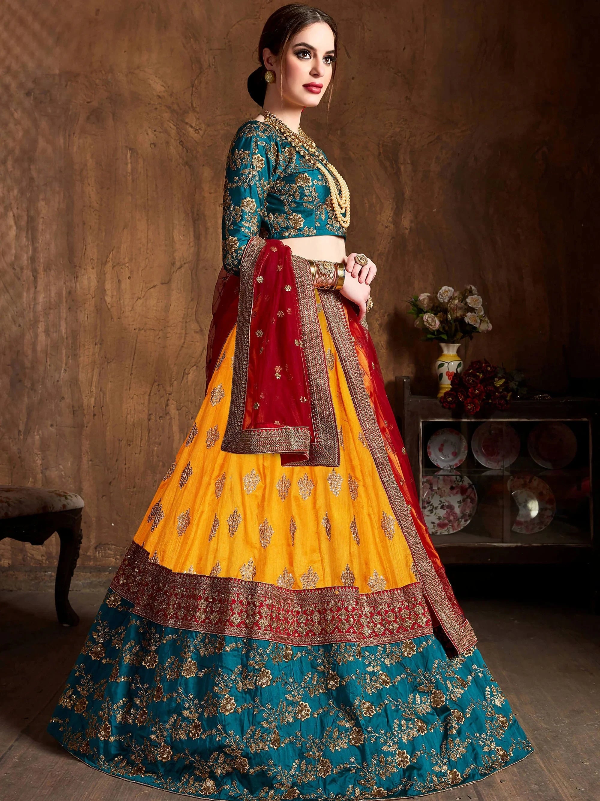 Majestic Yellow Embroidered Silk Wedding Wear Plus Size Lehenga Choli
