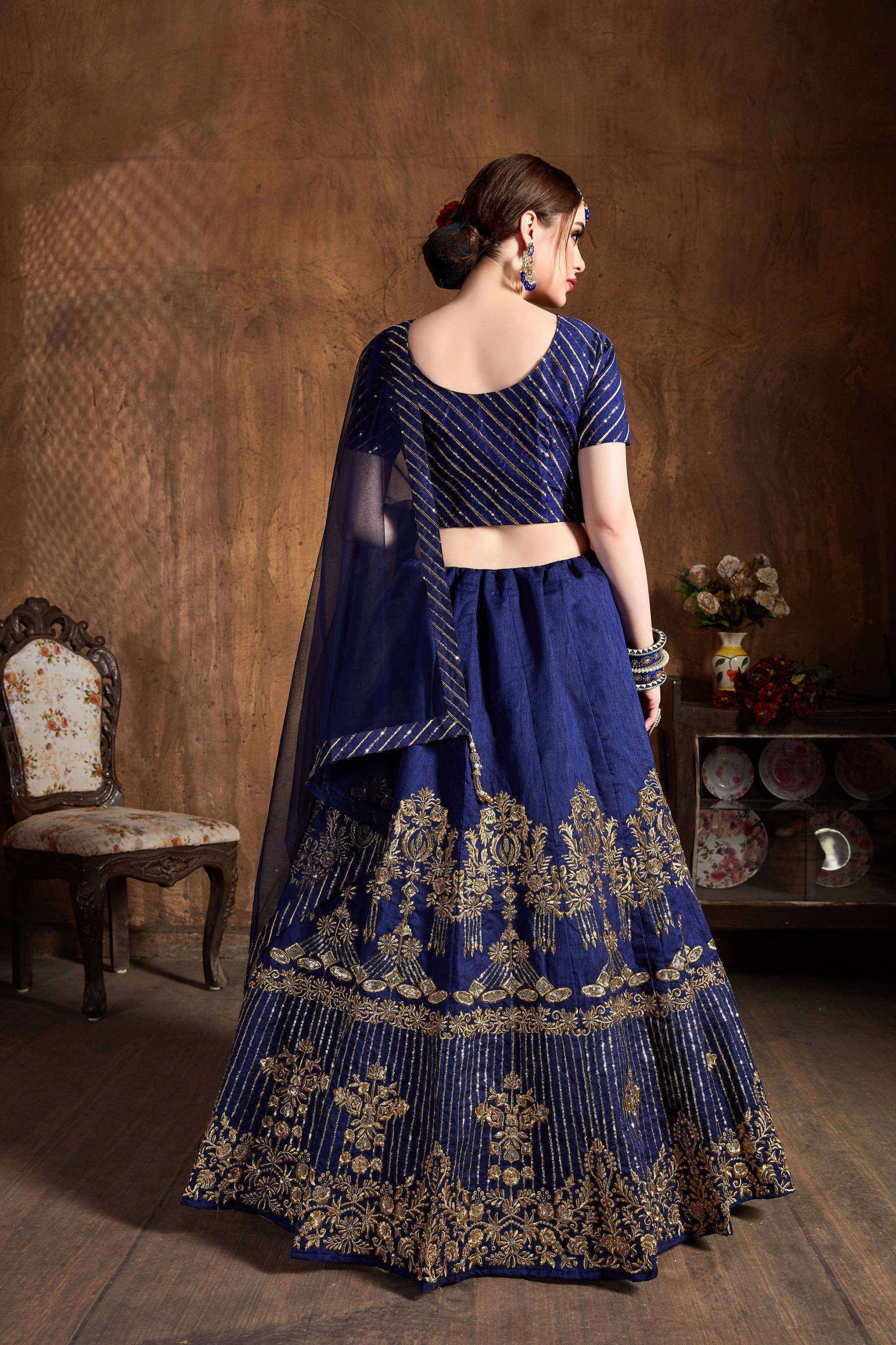 Royal blue lehenga choli with gold embroidery, perfect for Indian weddings and festive occasions