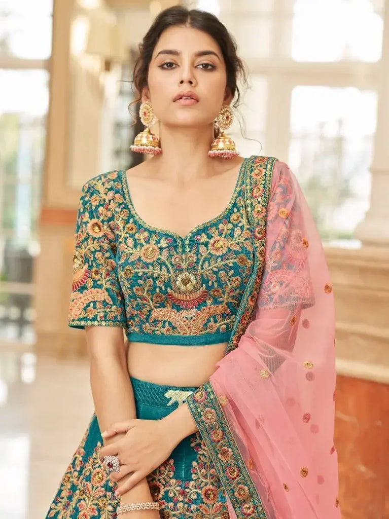 Ravishing Teal Blue Heavy Embroidered Velvet Bridesmaid Lehenga Choli