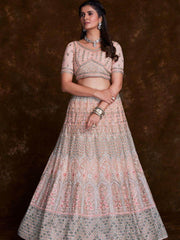 Delightful Peach Thread Embroidered Soft Net Bridal Lehenga Choli
