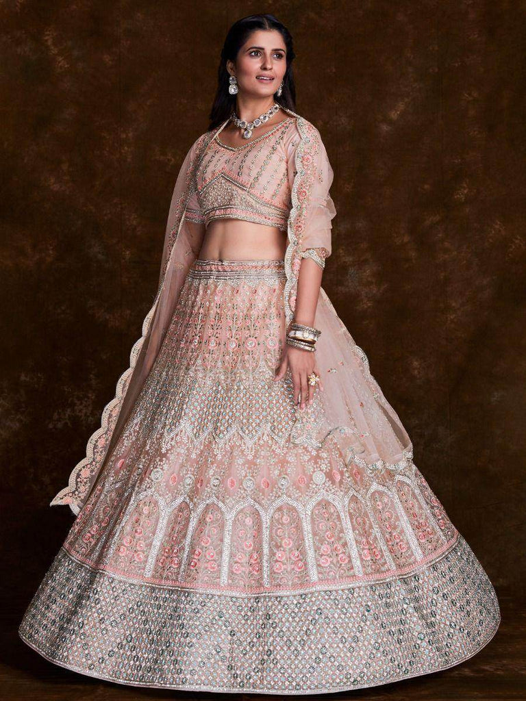 Delightful Peach Thread Embroidered Soft Net Bridal Lehenga Choli