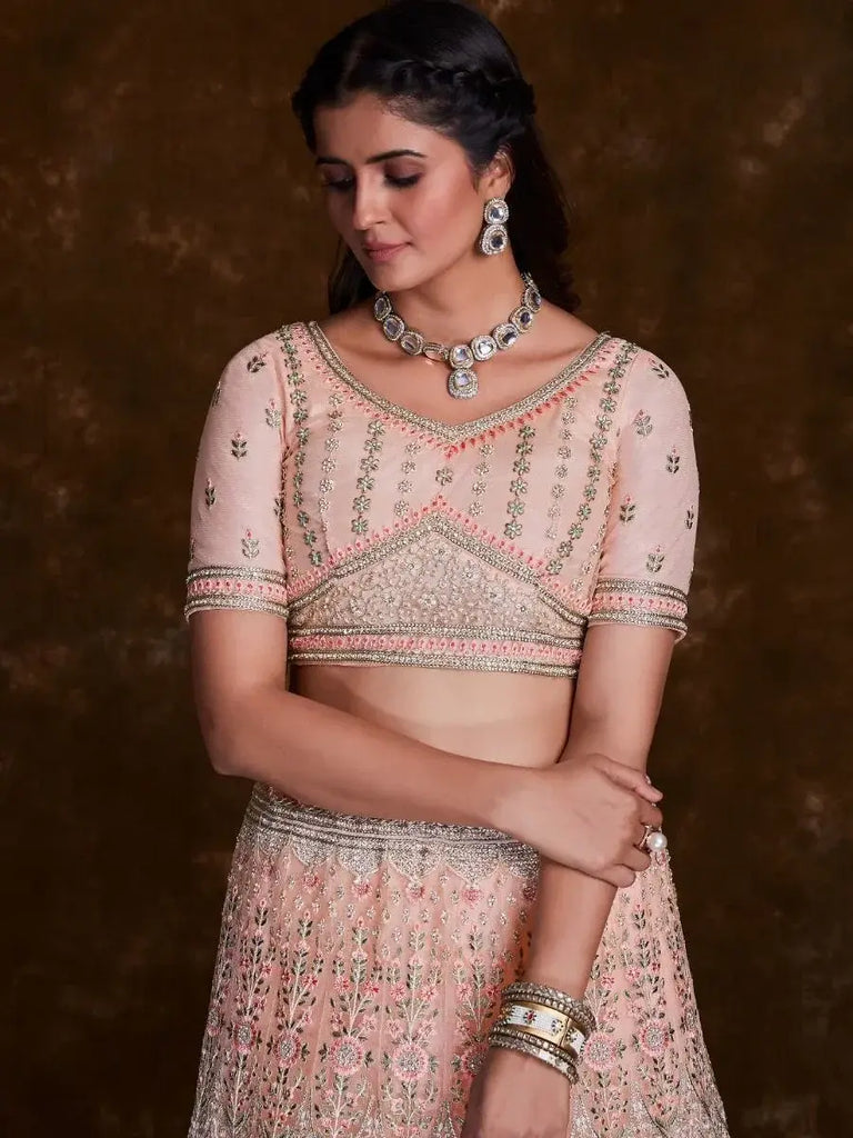Delightful Peach Thread Embroidered Soft Net Bridal Lehenga Choli