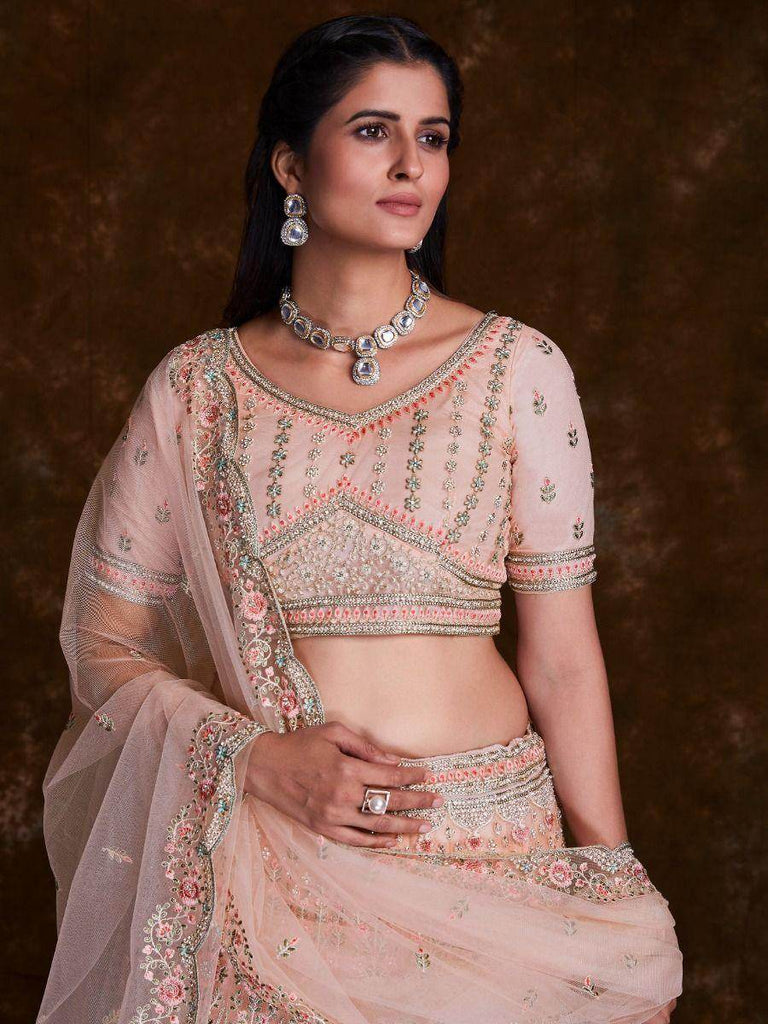 Delightful Peach Thread Embroidered Soft Net Bridal Lehenga Choli