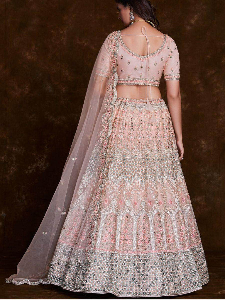 Delightful Peach Thread Embroidered Soft Net Bridal Lehenga Choli